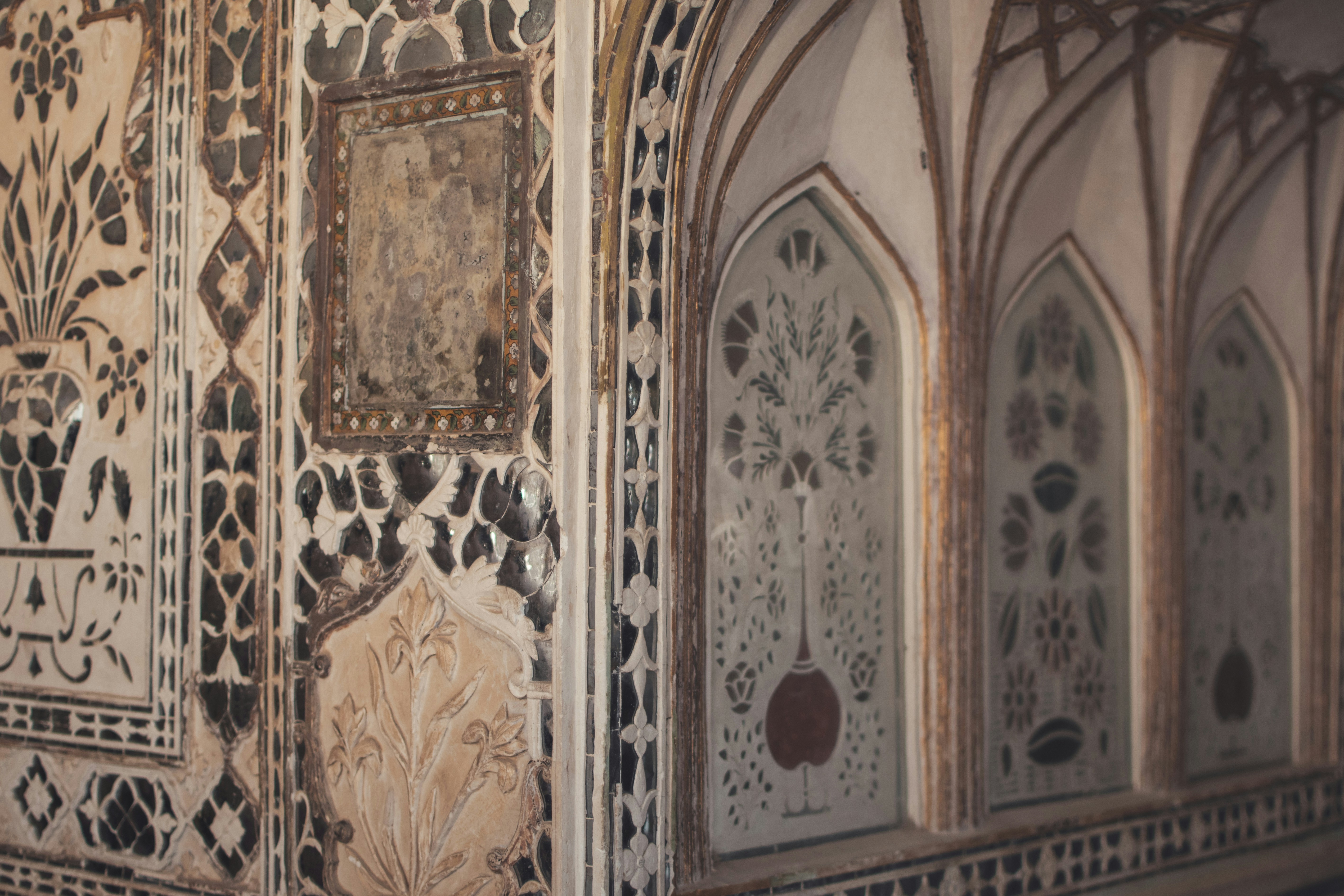 a close up of a wall with a clock on it
