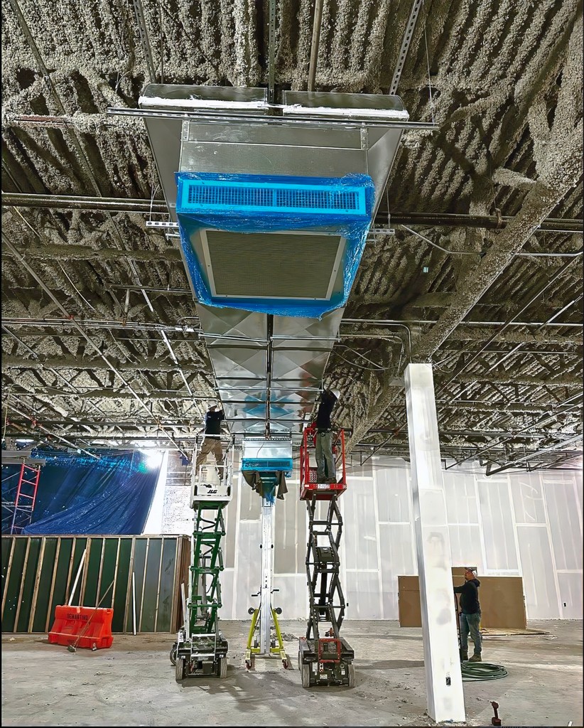 workers installng ductwork