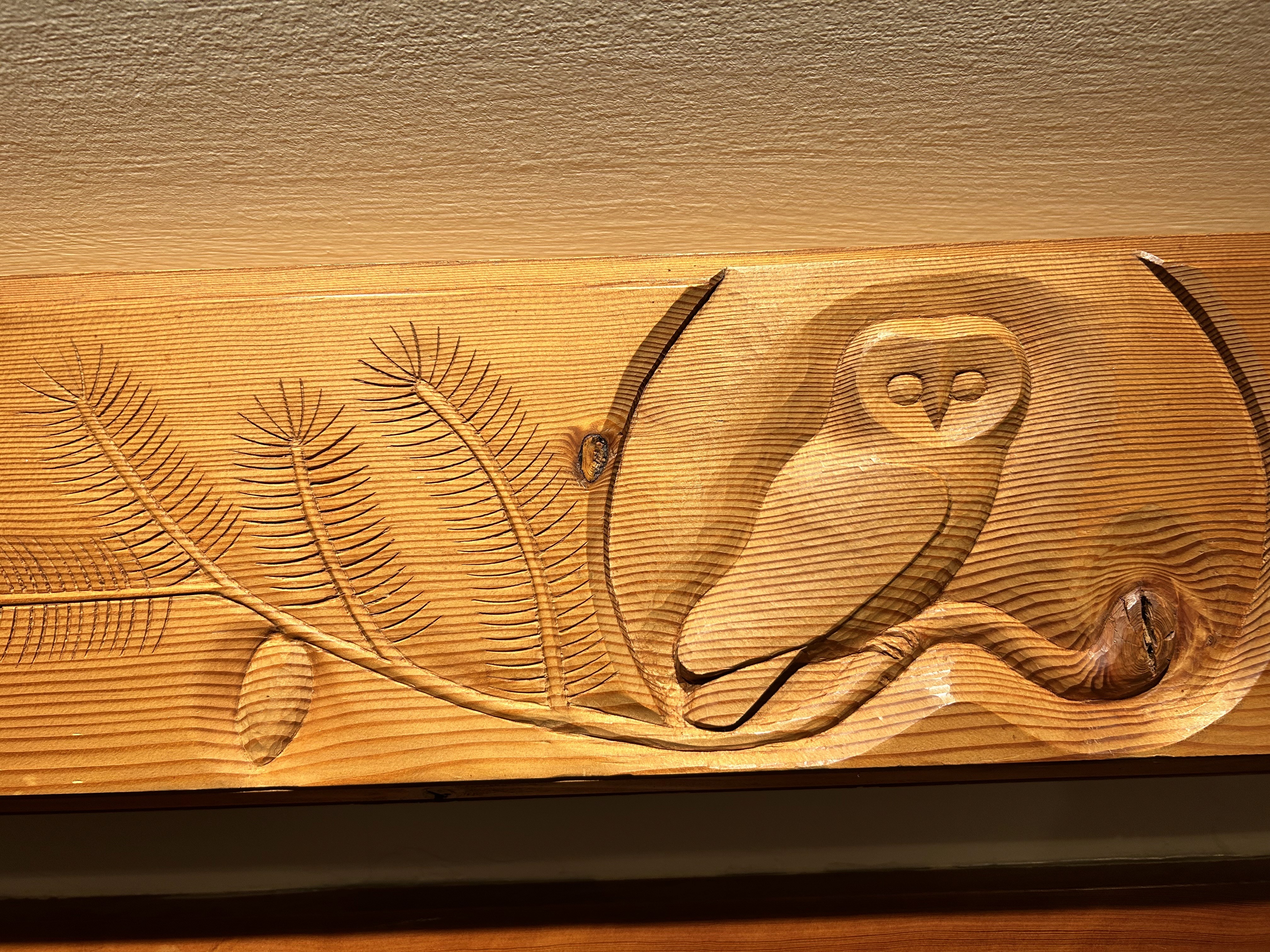 An owl carved into wokd