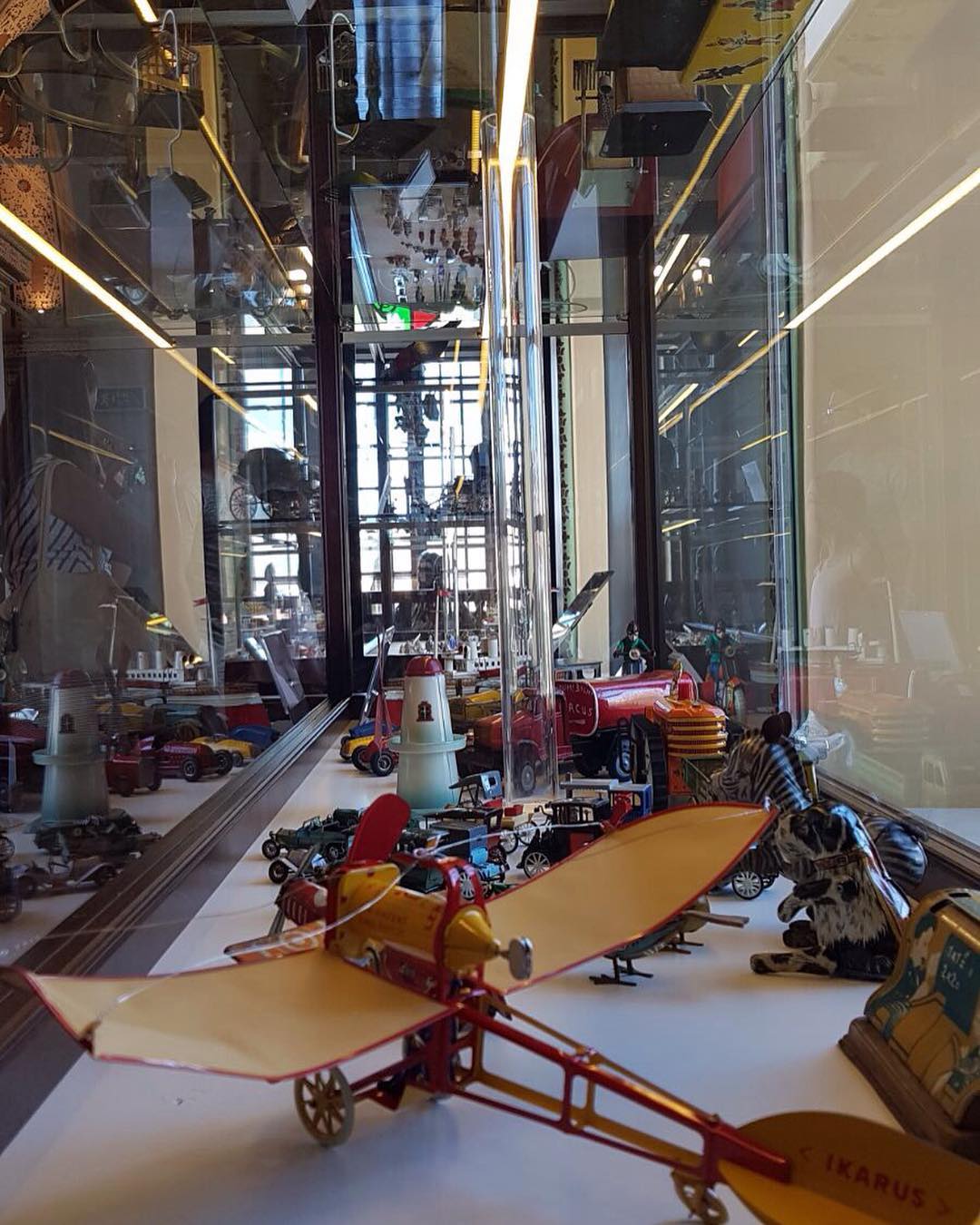 people in a large building with Tate Modern in the background