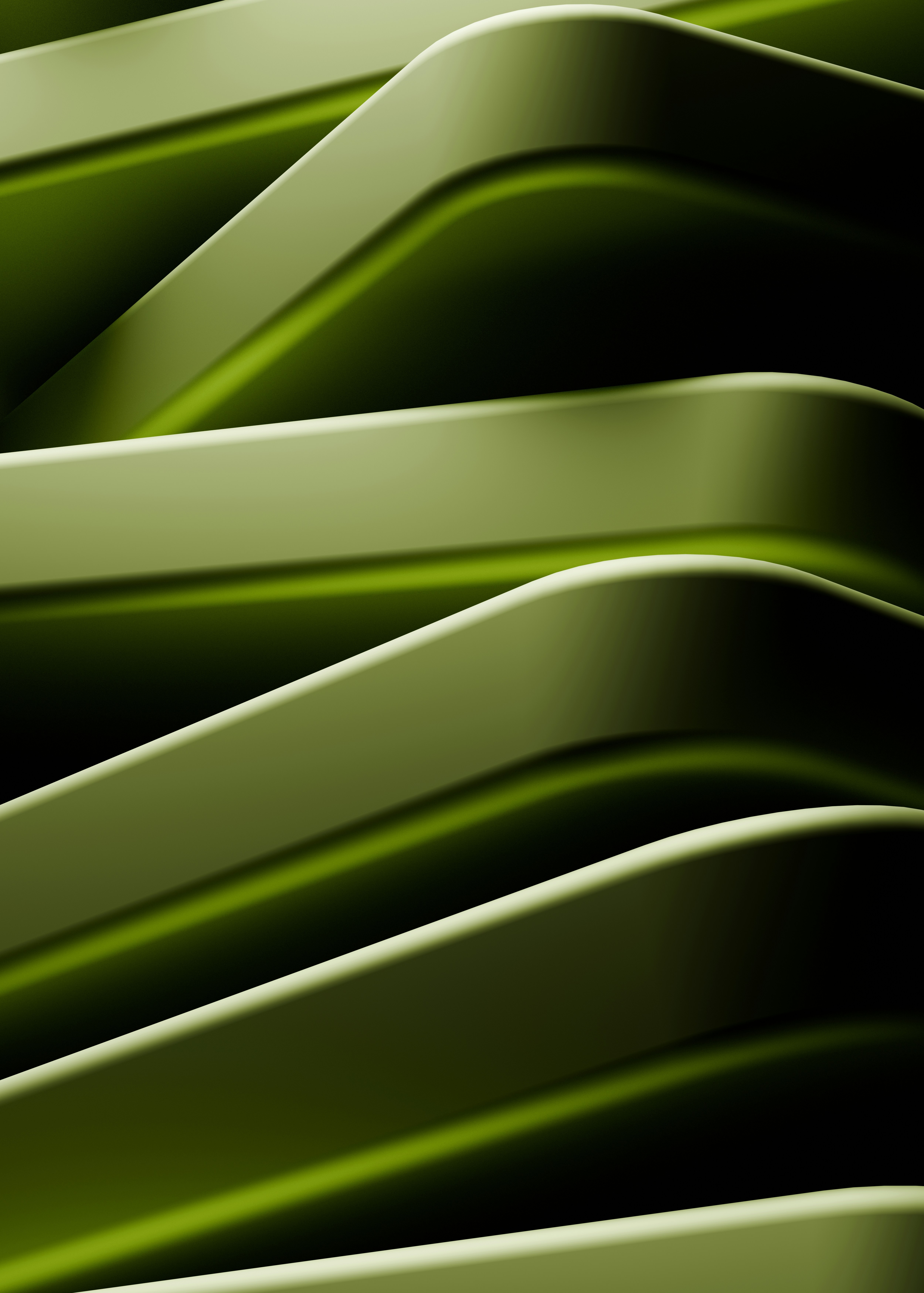 A smiling young man with crossed arms, wearing a plaid shirt and white t-shirt, poses against a dark background.