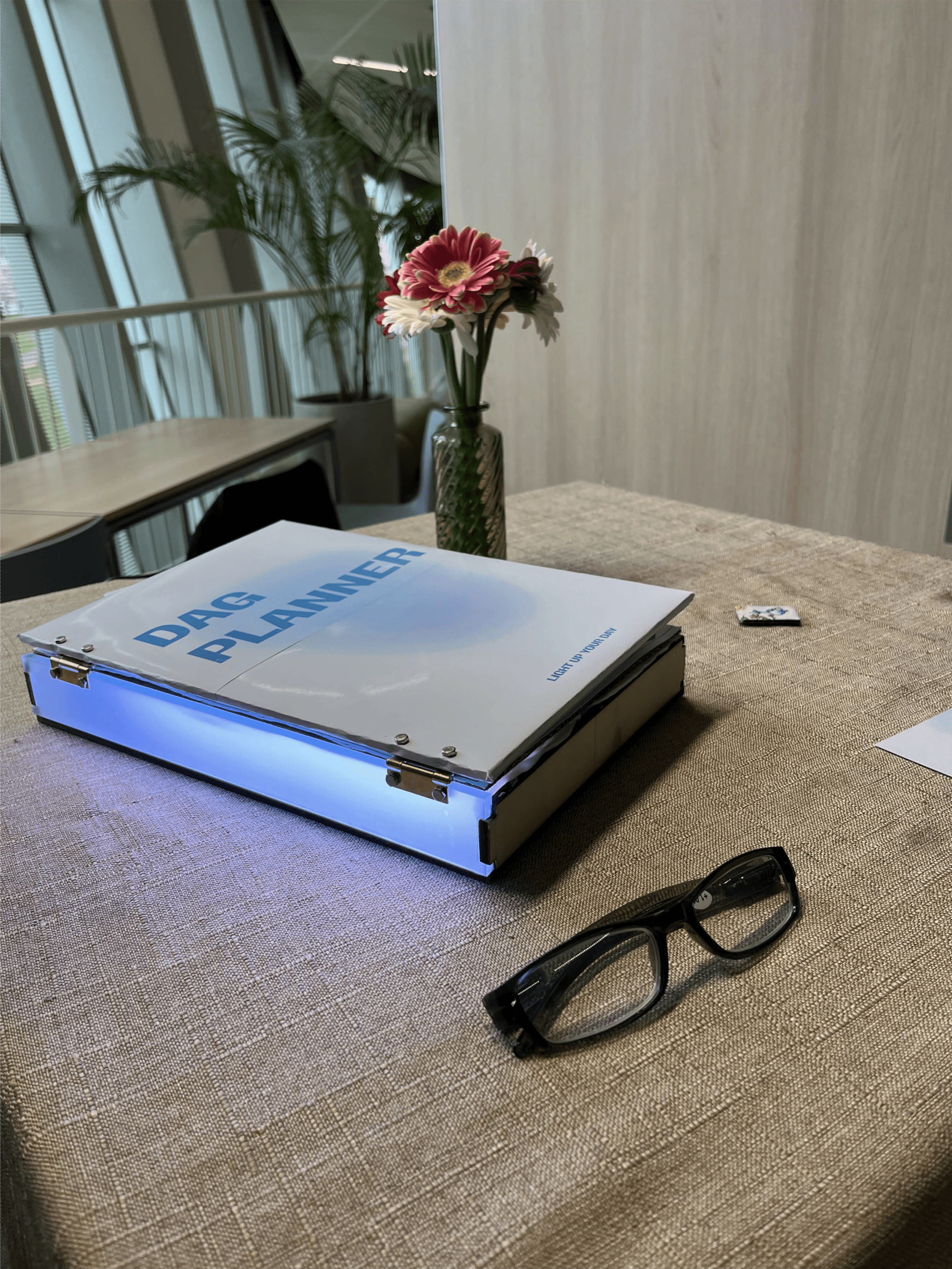 White outline of a spherical grid-within-a-globe icon followed by the word “Orbita” in white sans-serif type, centred on a smooth lime-to-forest green gradient background.