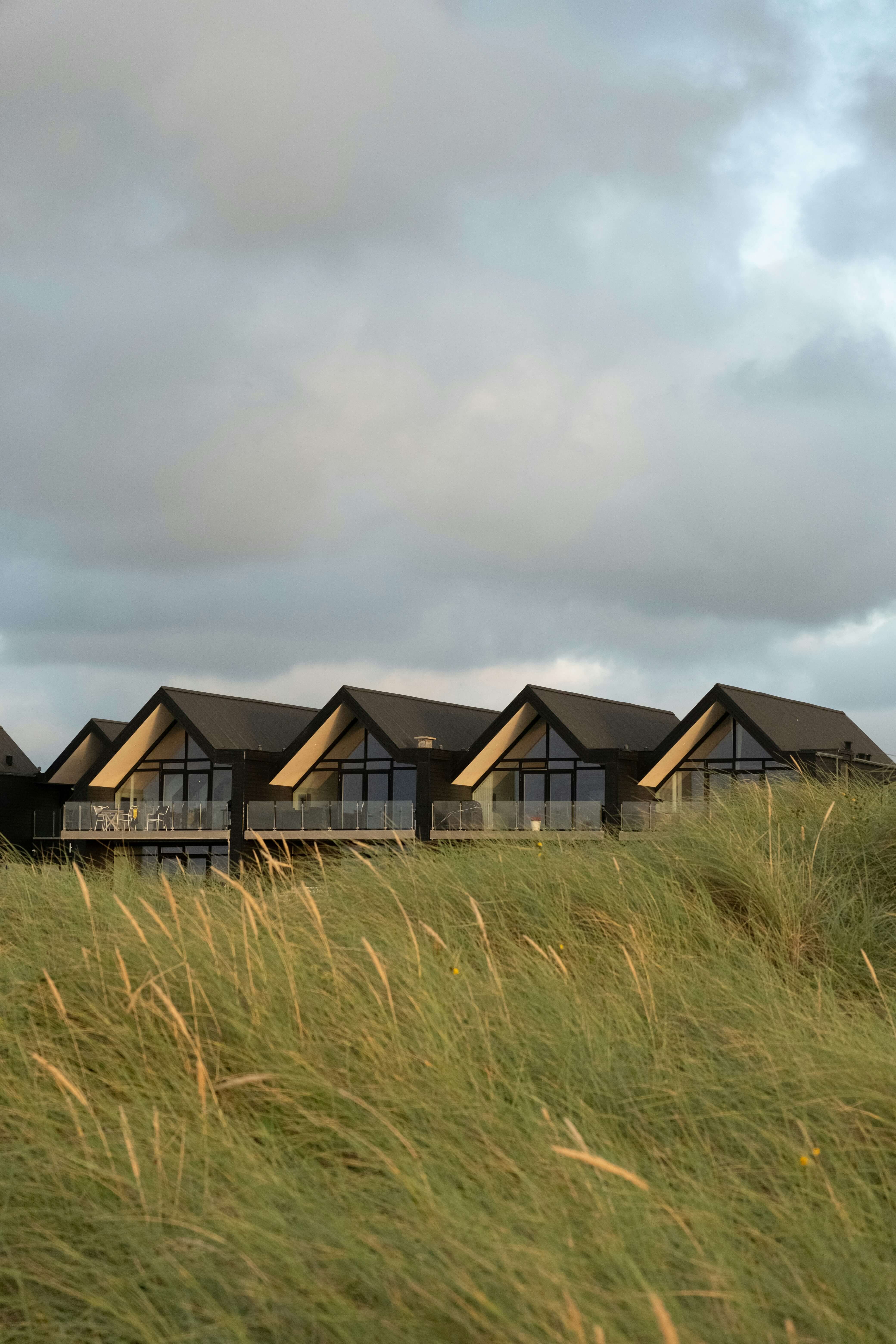 Four two-storey houses laying side by side