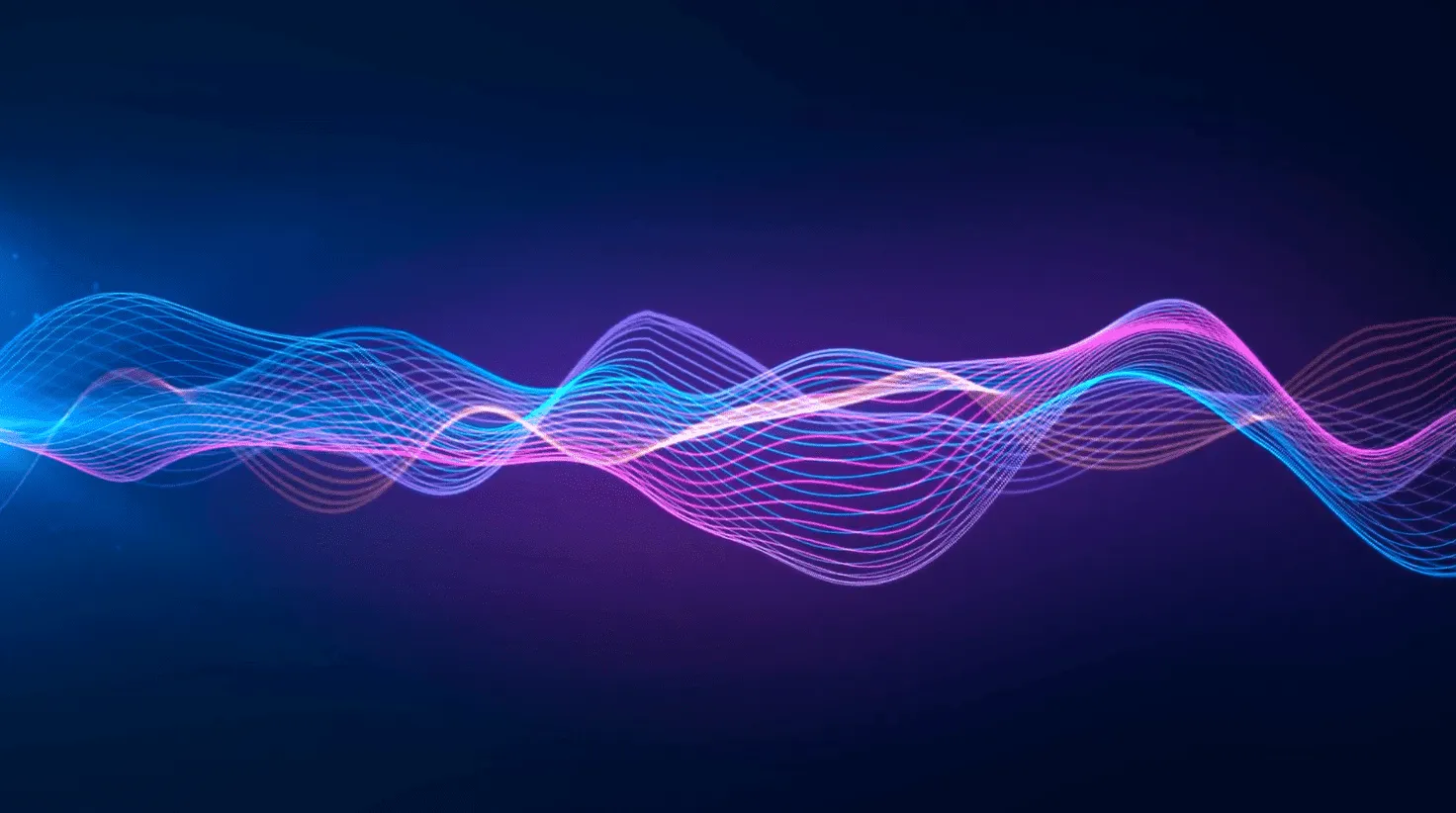 Speech waves shown in electric neon colours against a dark blue background