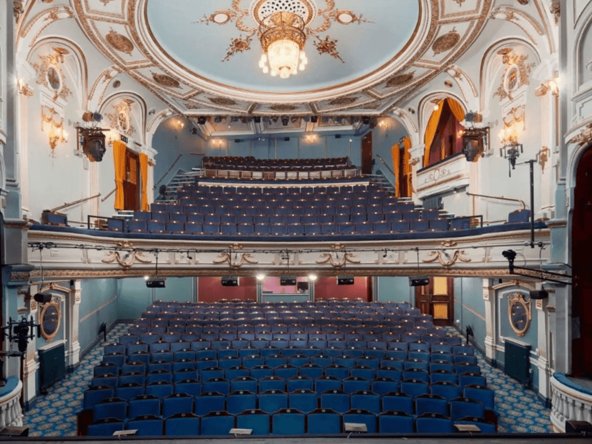 Ambassadors Theatre auditorium as seen from the stage.