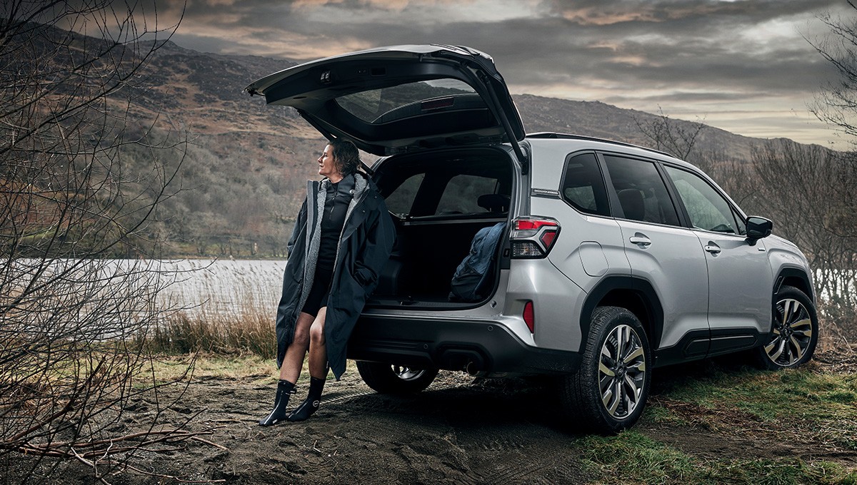 Billboard above a traffic jam that reads 'Bad news you've stopped, good news: you've stopped'