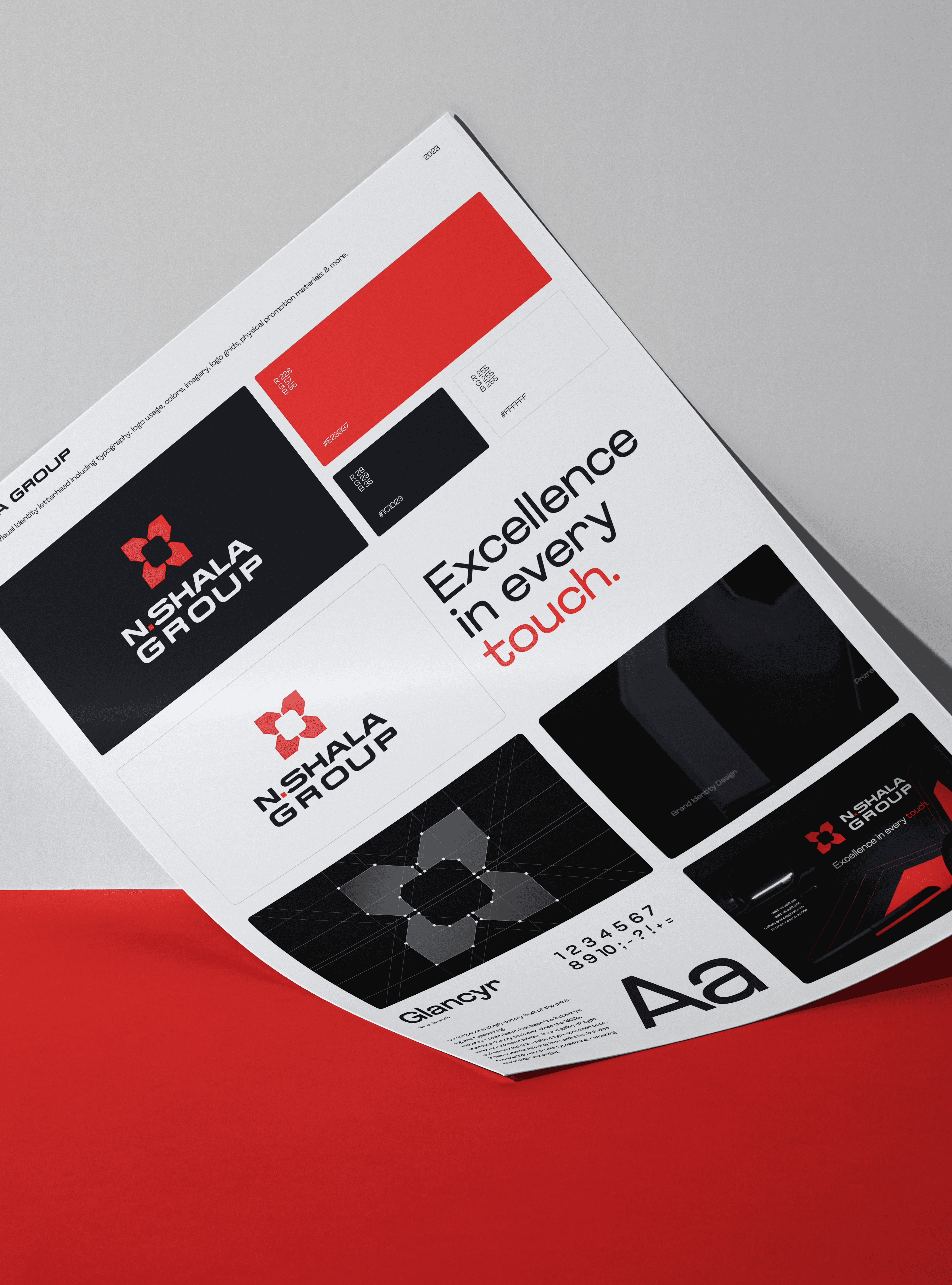 Jagged mountains rise above a dark blue lake.