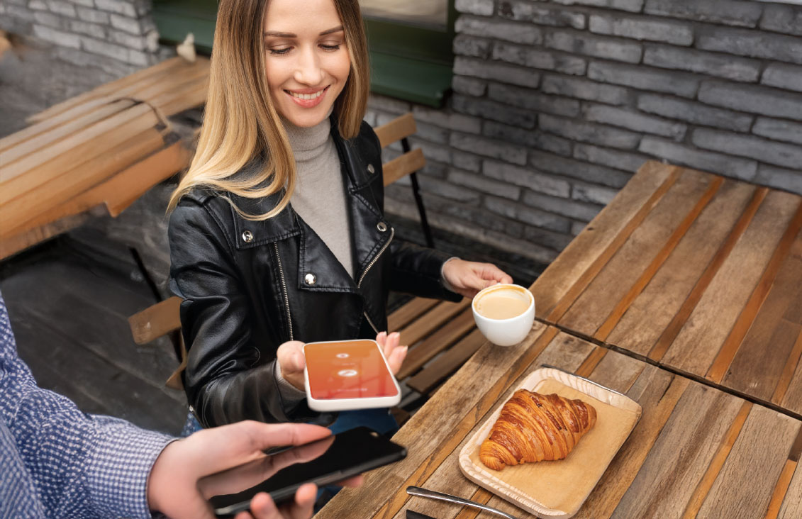 Snow-covered mountain peak illuminated by sunset light