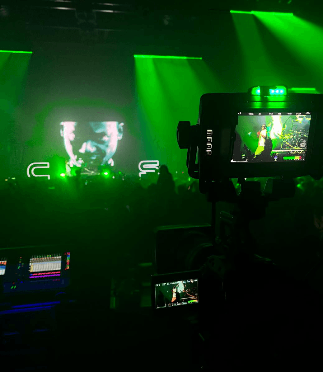 a black and white photo of a man in a sweater