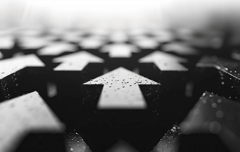 Person sitting in a modern office in front of a wall covered with notes and sketches.