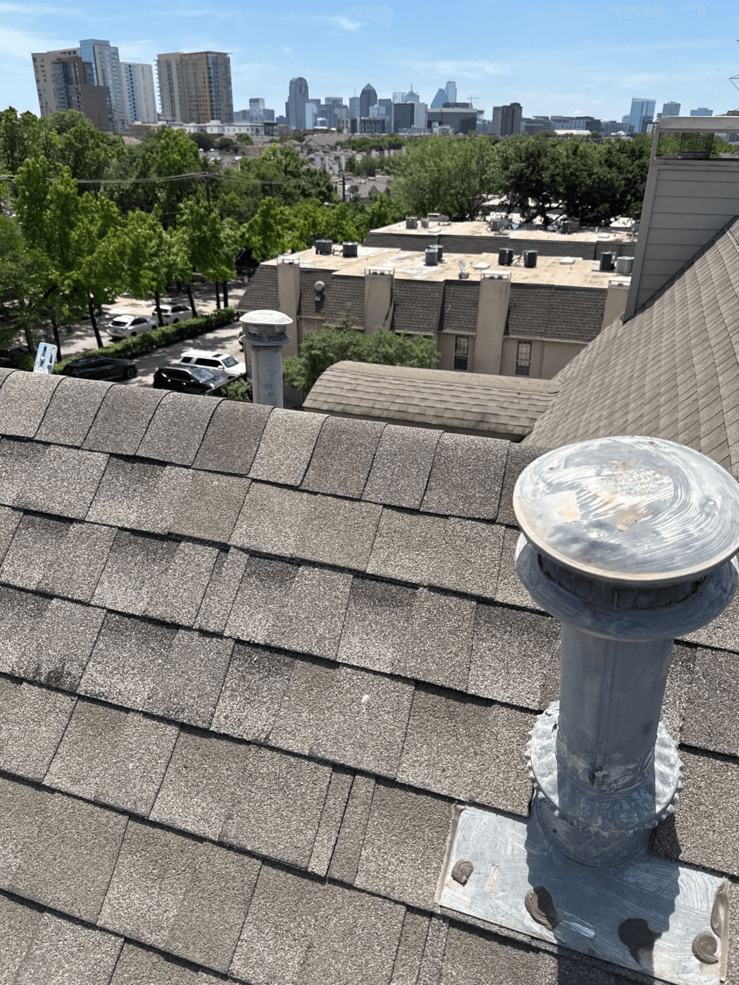 top of apartment building rooftop view of dallas skyline
