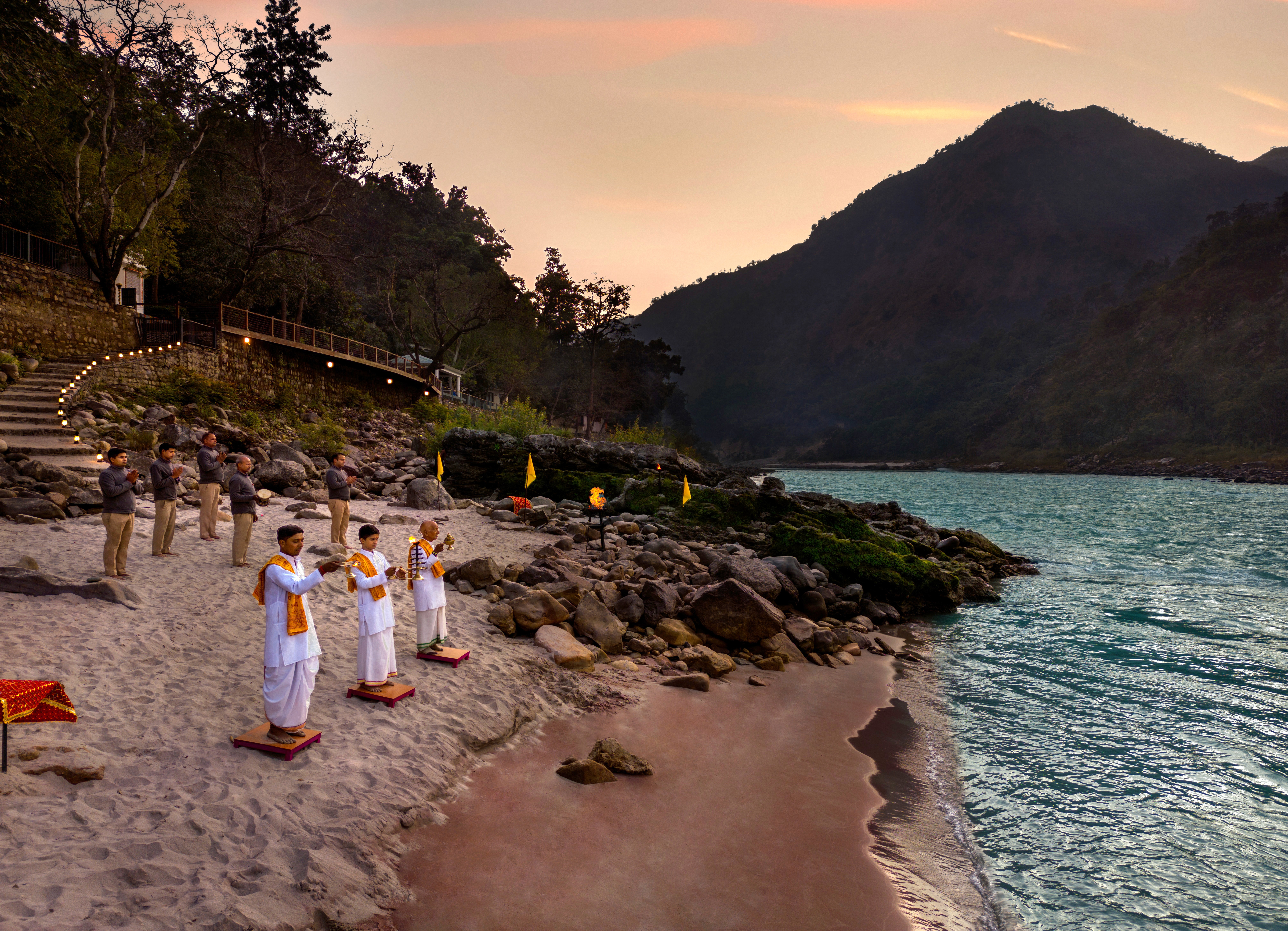 People doing aarti on river bank