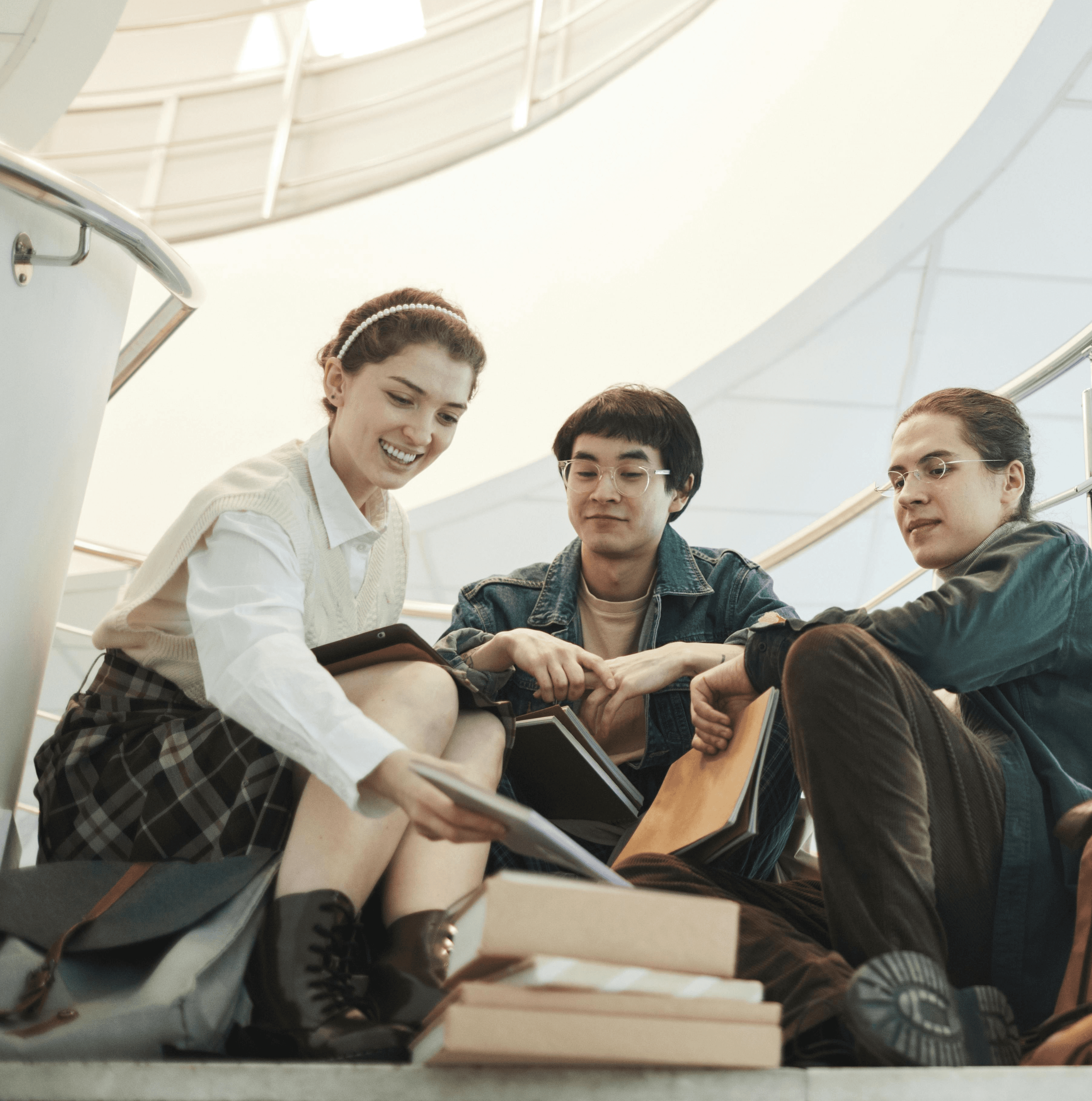 five children smiling while doing peace hand sign
