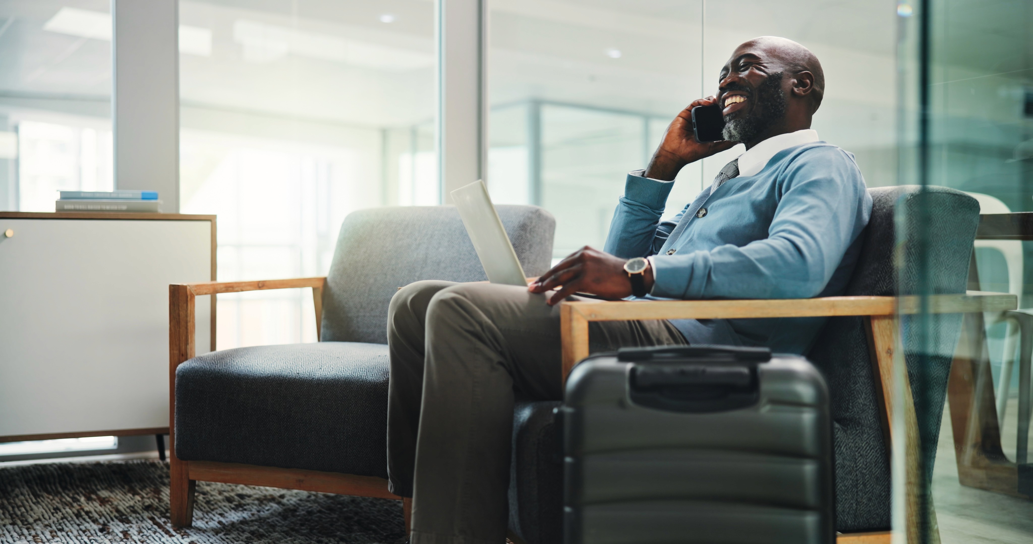 man holding luggage photo