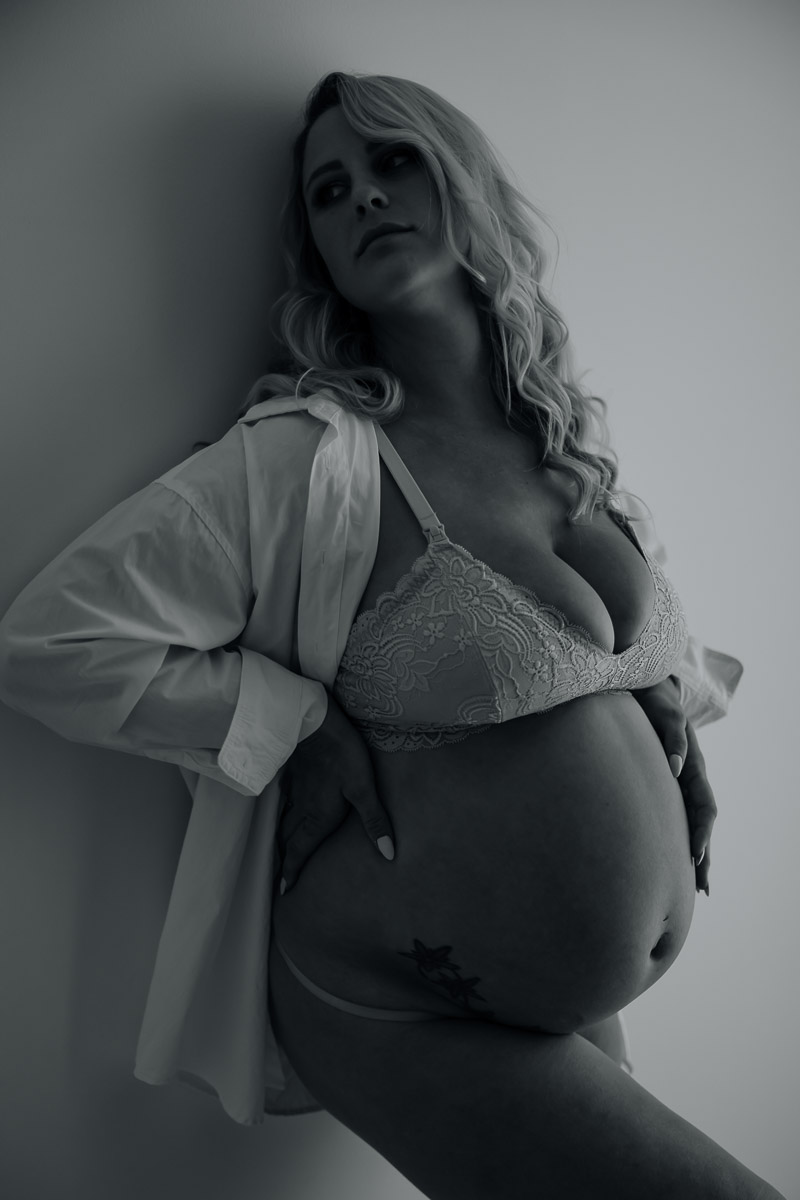 Black and white maternity portrait captured in Mackay studio