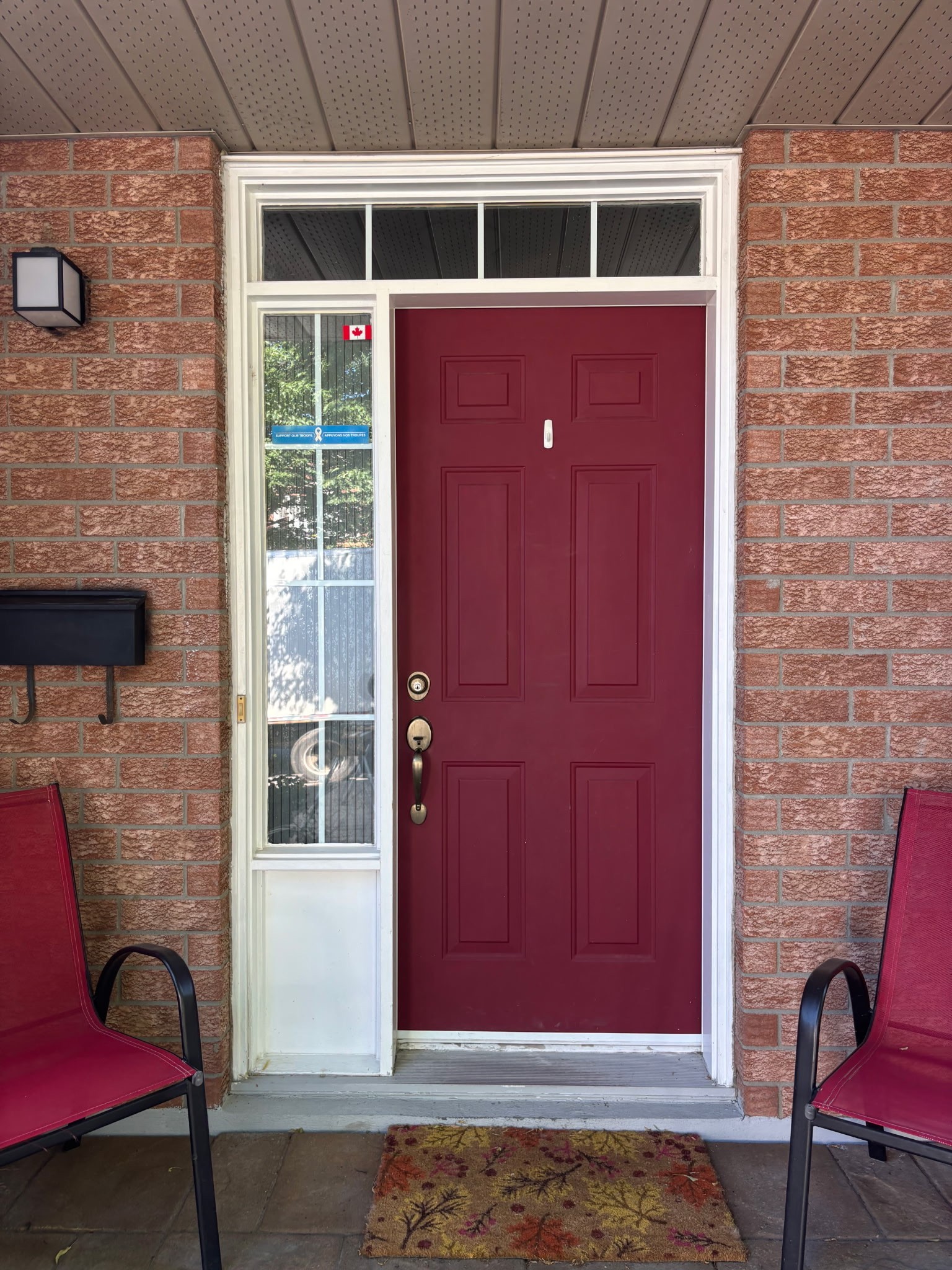 Before Intallation photo - The Imperial — black frame window installation, Ottawa home exterior