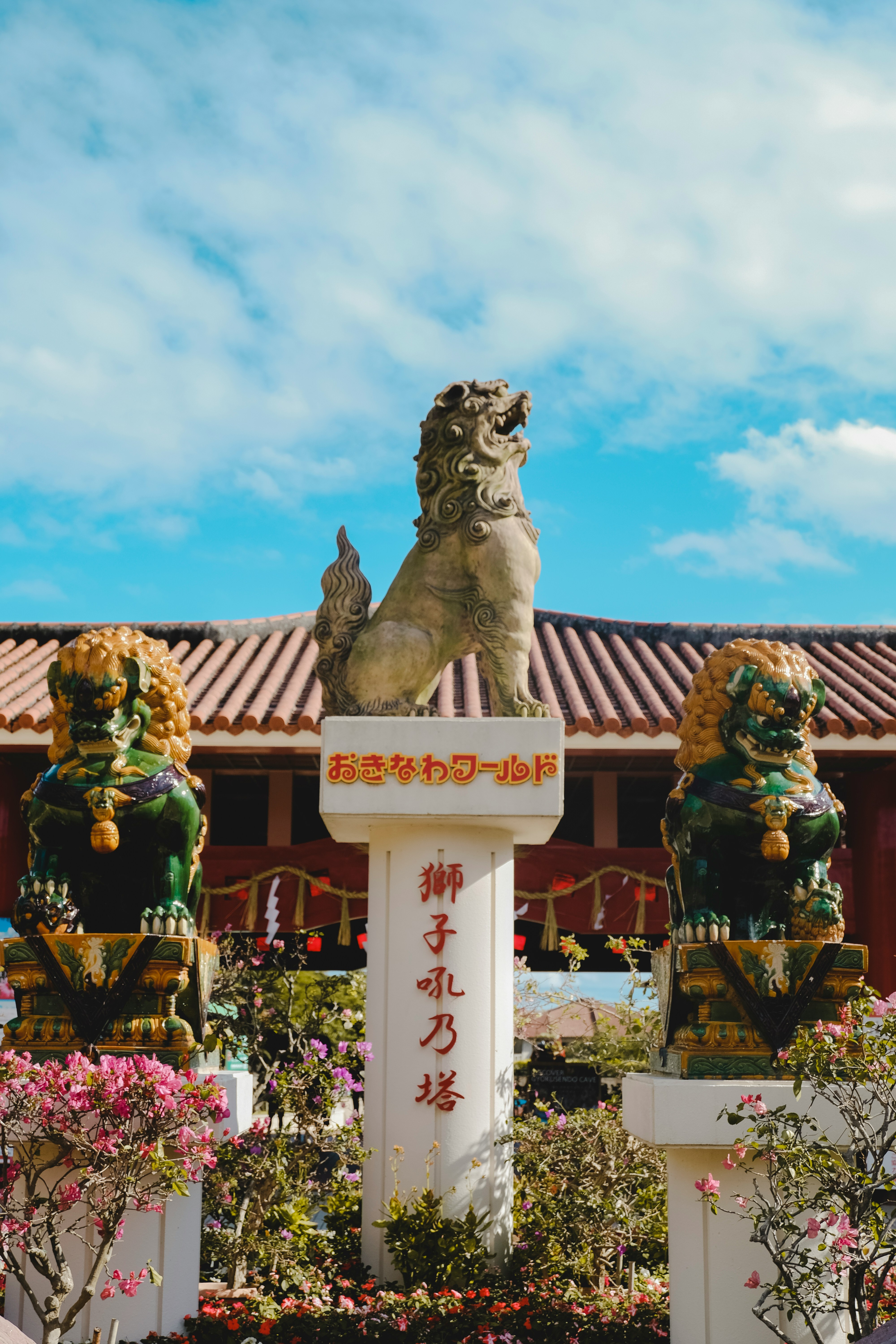 brown lion statue under blue sky during daytime