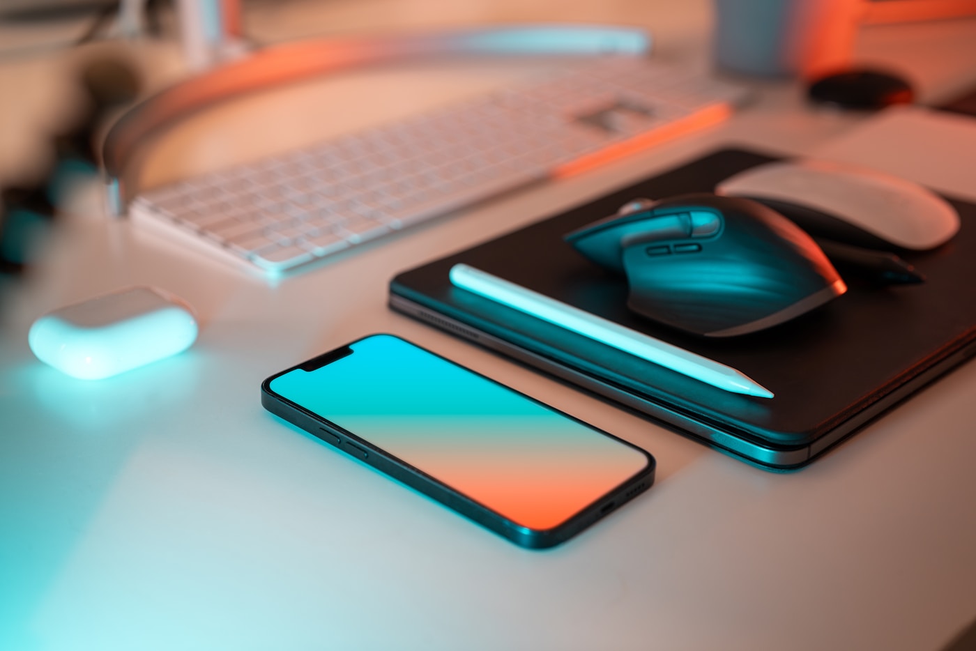 Laptop and devices on a desk used as Orbitly project thumbnail