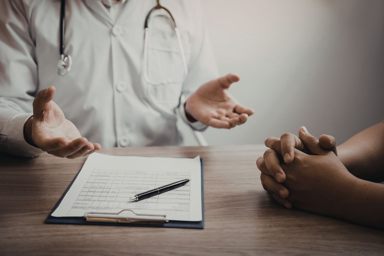 Doctor talking to patient