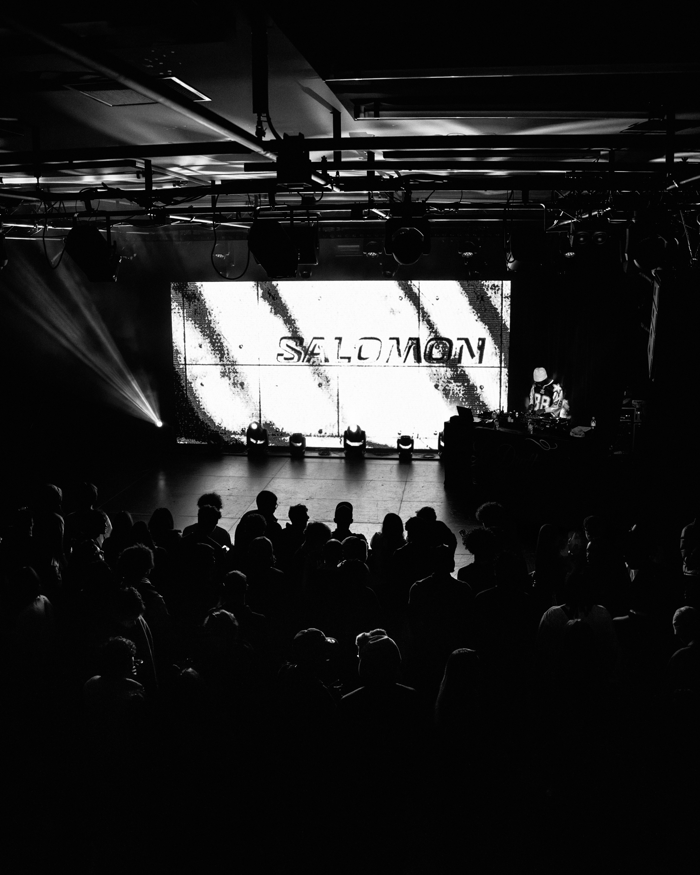 Coffee stored on a shelf in a coffee shop