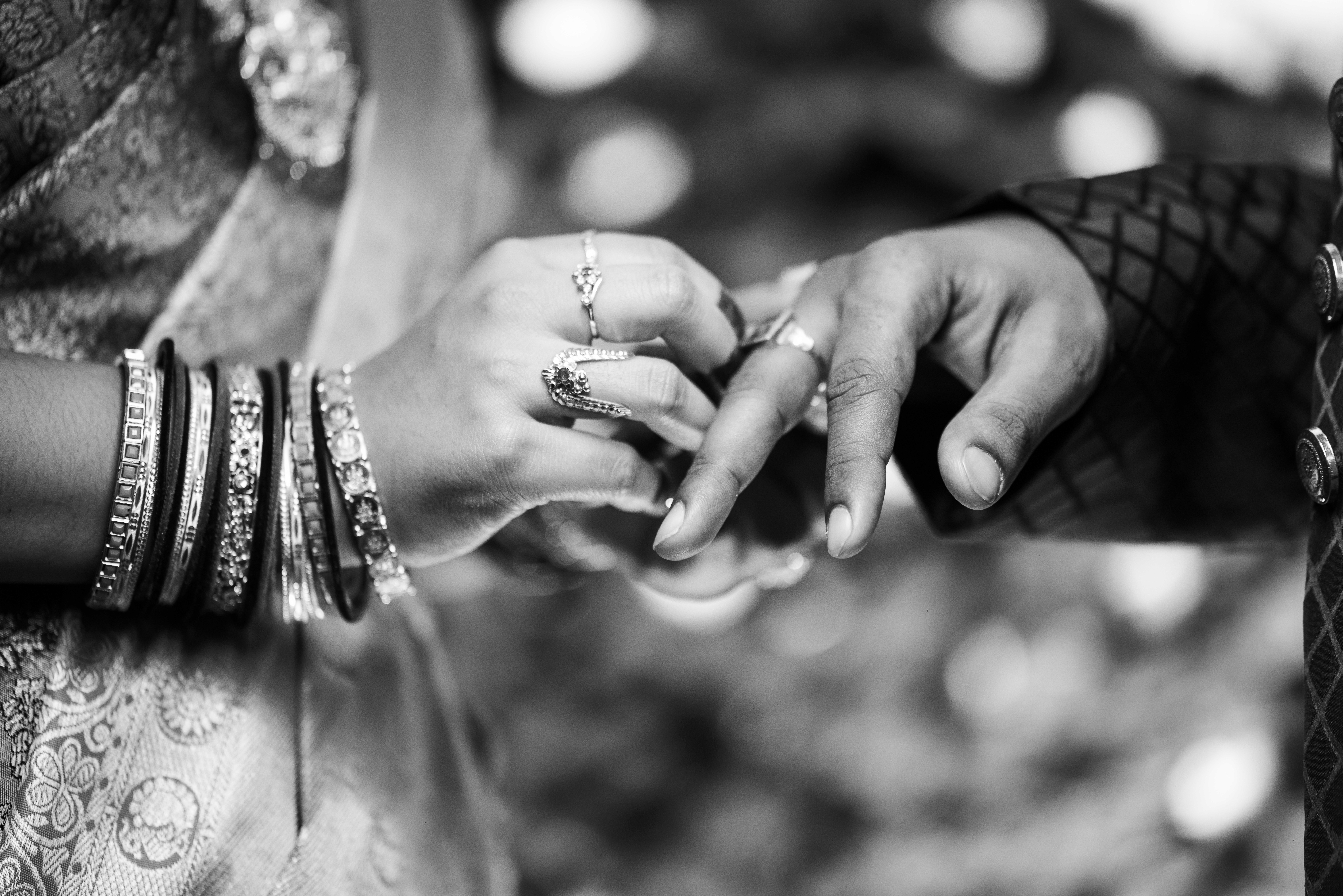 a woman in a red dress with a red veil on her head