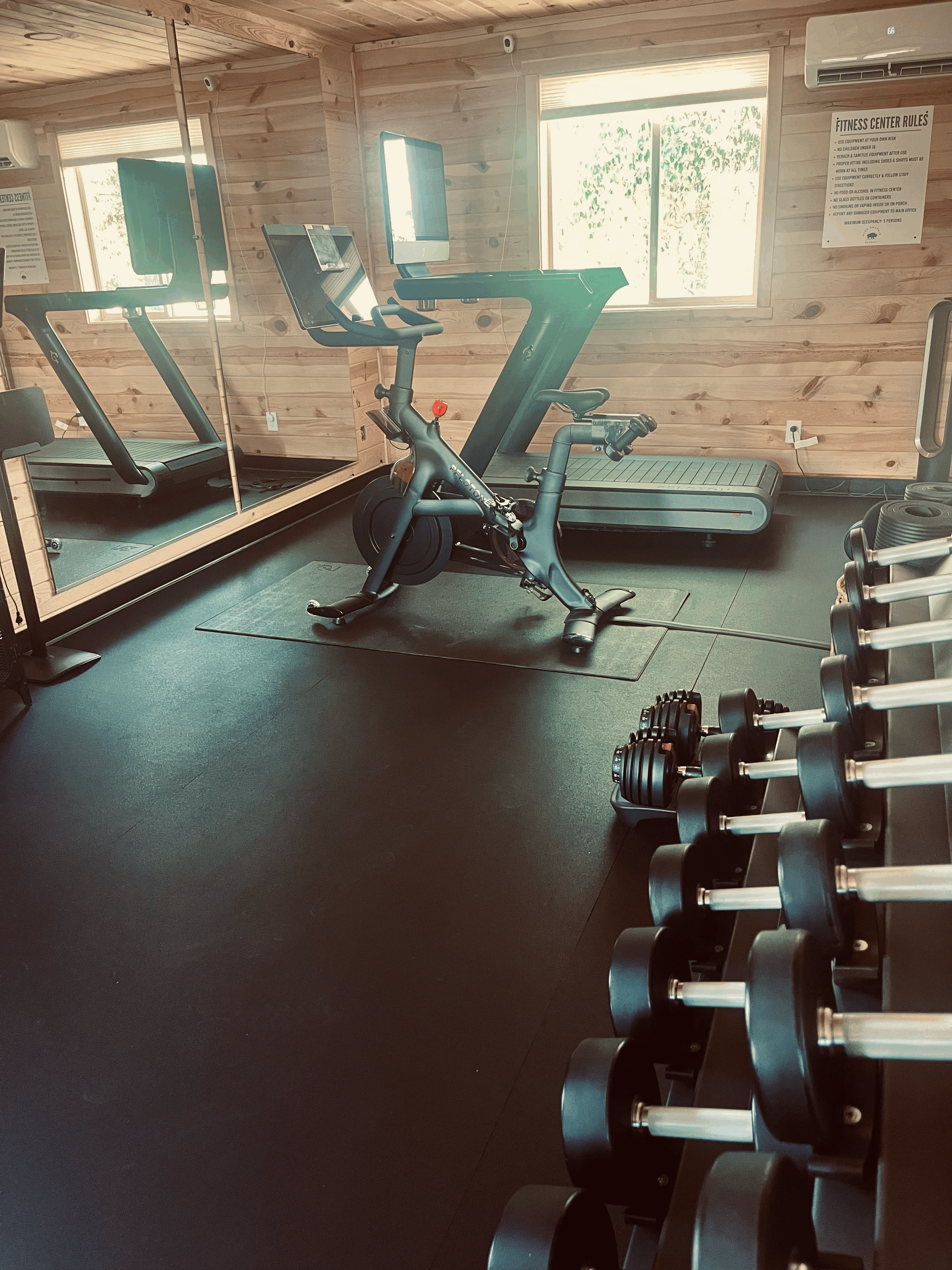 A woman on a treadmill in a gym
