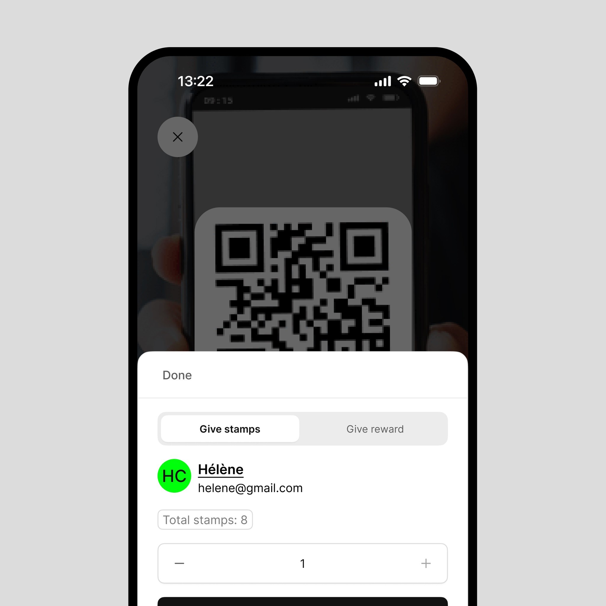 lady checking her phone and smiling