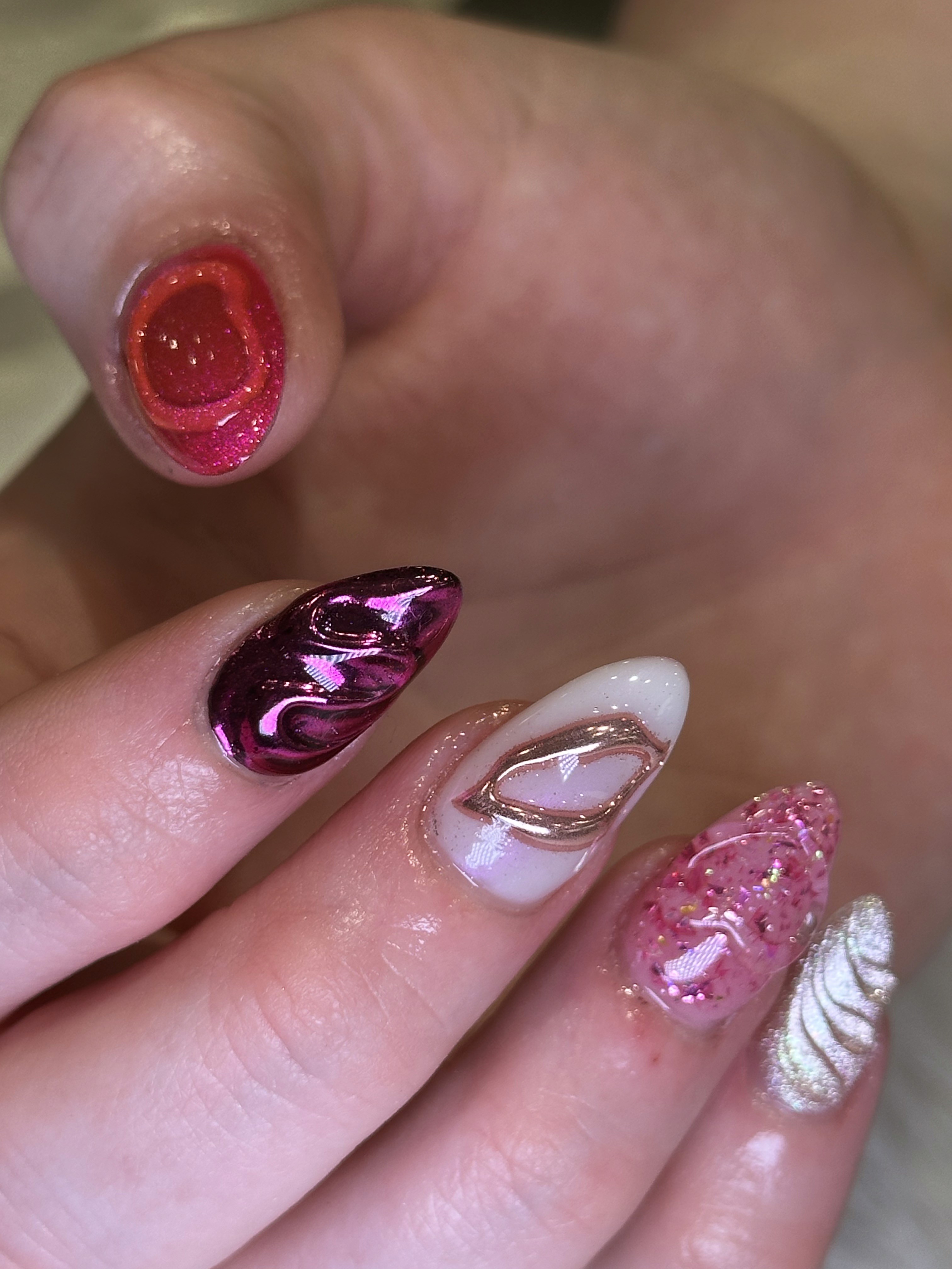 Gel-X nails with chrome and glitter nail art at luxury nail salon Naperville