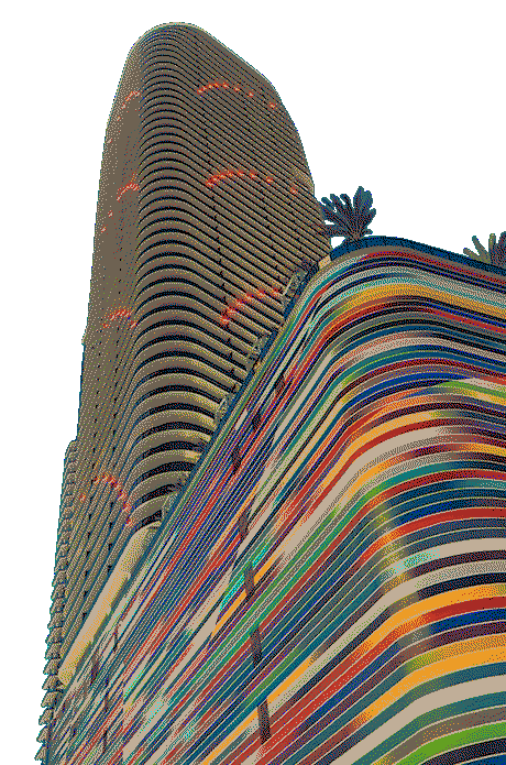 Persona hablando directamente a cámara en una sala de juntas moderna, con mesas, sillas y grandes ventanales al fondo.