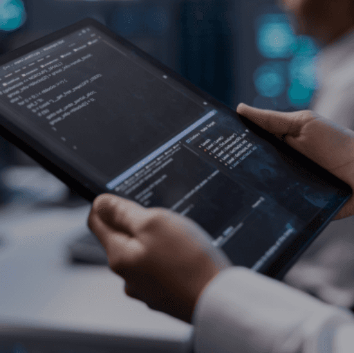 a Tech person holding a tab