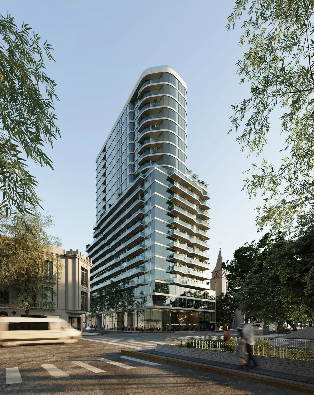 Edificio moderno de gran altura con fachada de vidrio, rodeado de árboles y paisaje urbano. Cielo brillante arriba.