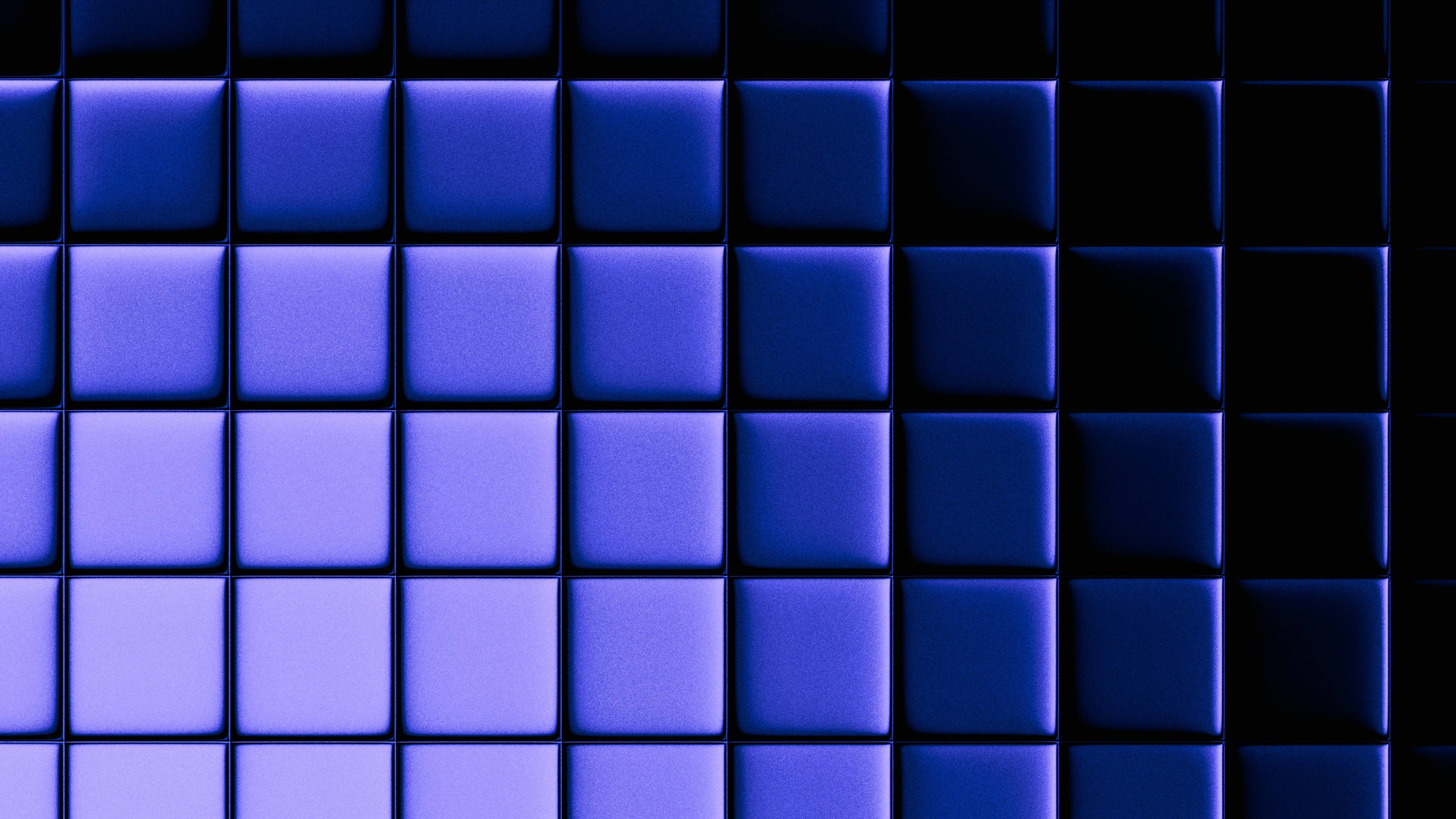 A grid of blue squares fading to black