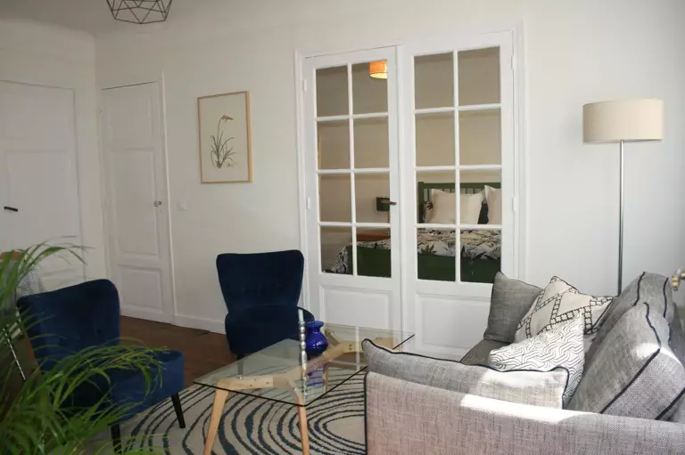 a bowl of fruit sitting on a kitchen counter