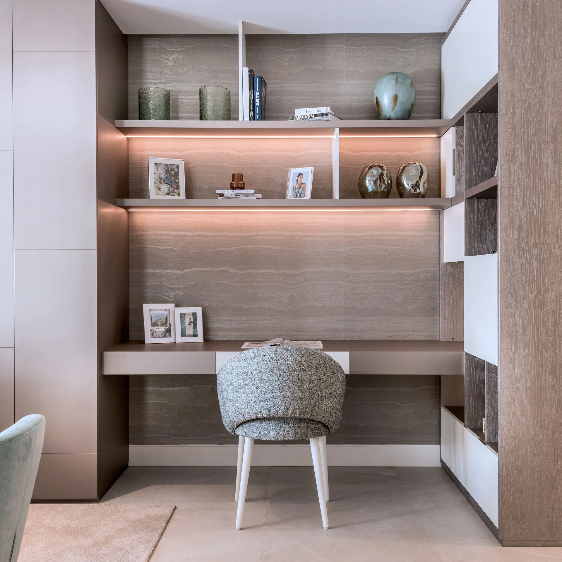 Golden cross atop a domed building with blue sky.