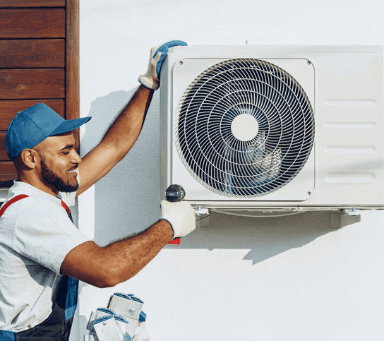 HVAC technician installing outdoor AC unit for residential HVAC services in Mississauga