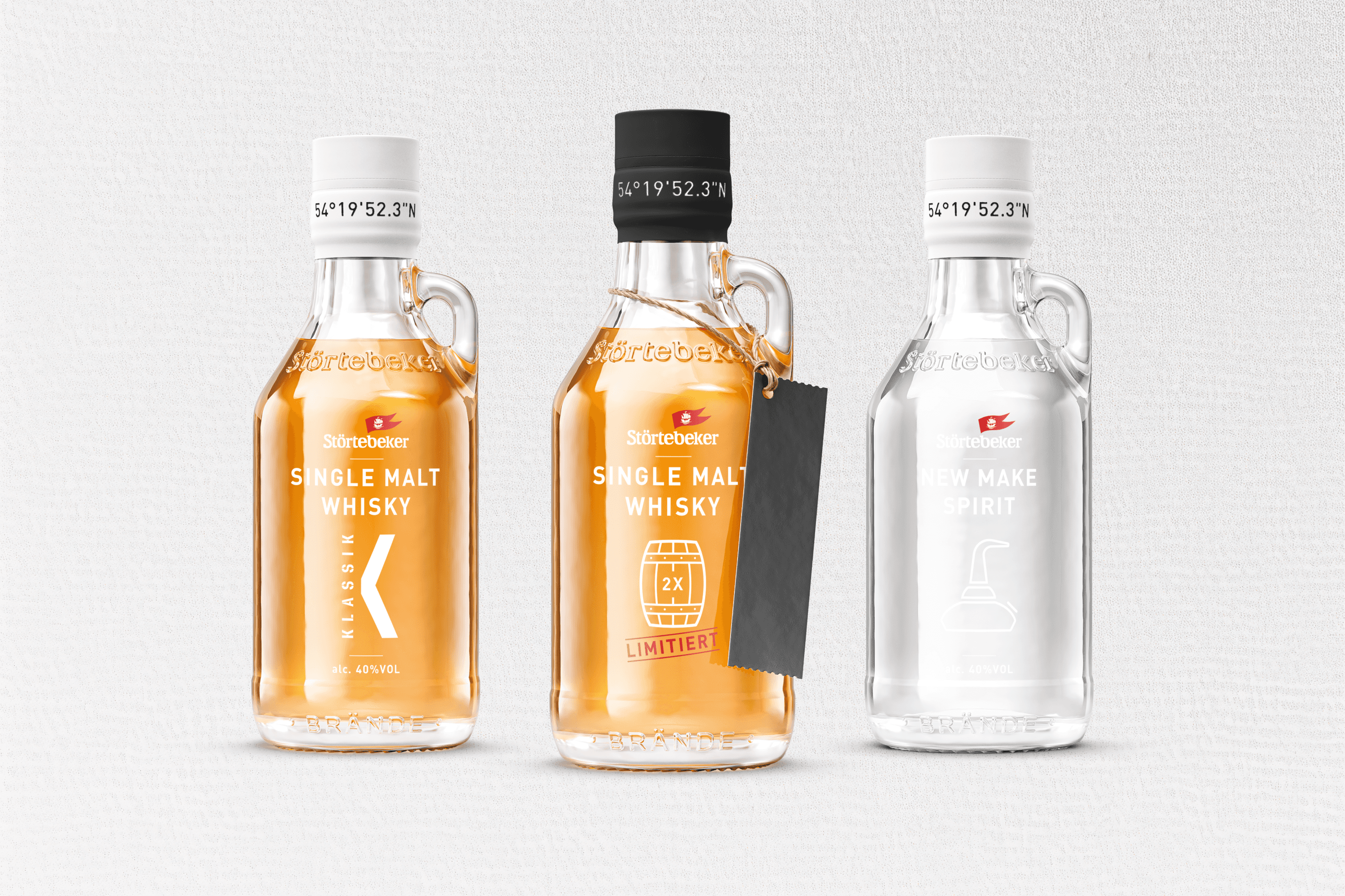 Three Störtebecker spirit bottles: whisky, limited whisky, and new make spirit.