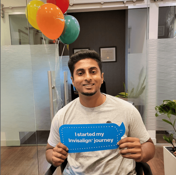 Male Invisalign Patient ScarboroSmiles Dental Clinic in Scarborough, ON | Best dentist in Scarborough, ON.