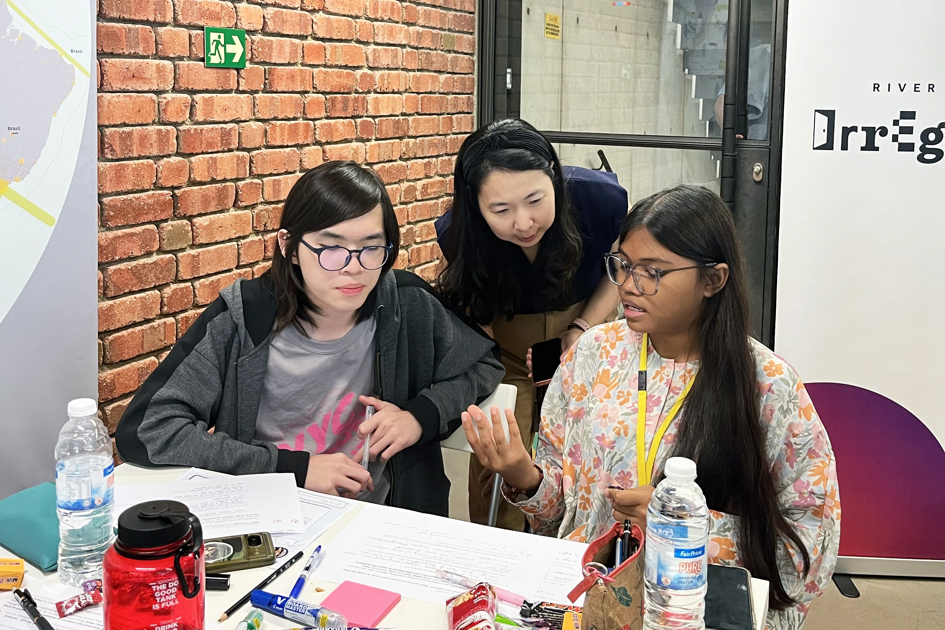 Workshop participants and the facilitator engaged in a thoughtful discussion during the Empathy session