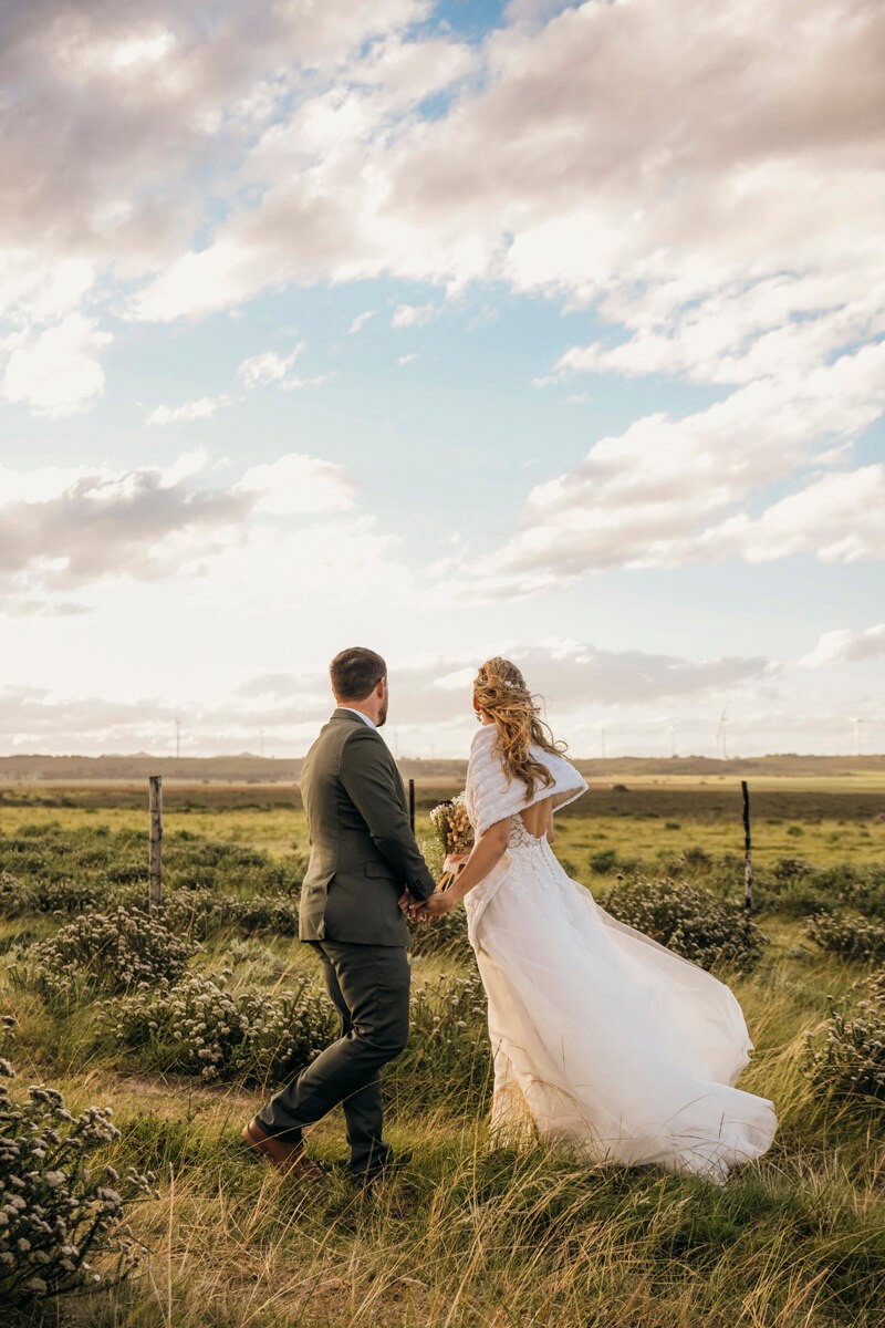 Couple portrait overlooking open plains during Lombardini wedding shoot