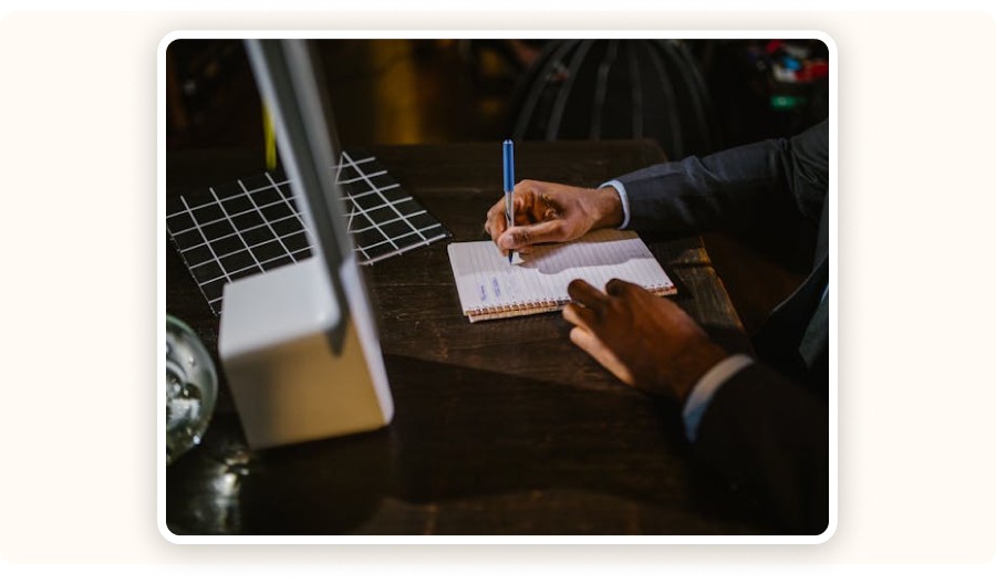 man taking notes