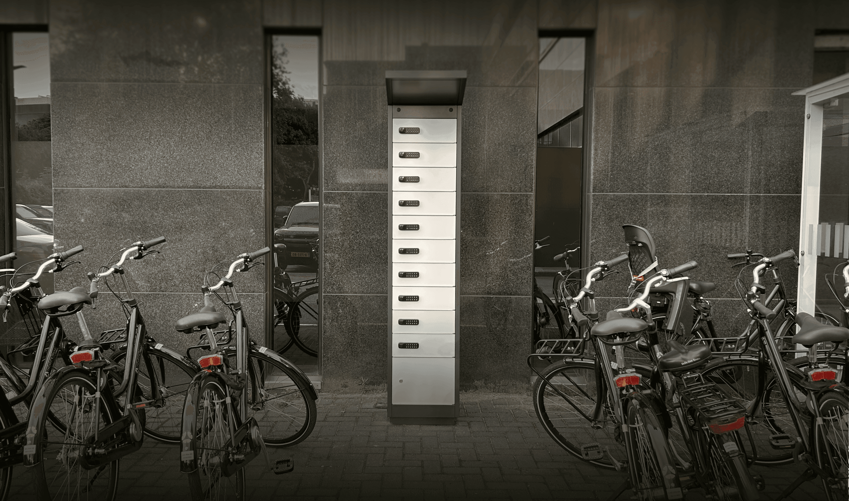 Fire-safe e-bike charging locker installed at Okura Hotel, designed for secure and organized charging of electric bicycles in a modern, elegant environment.