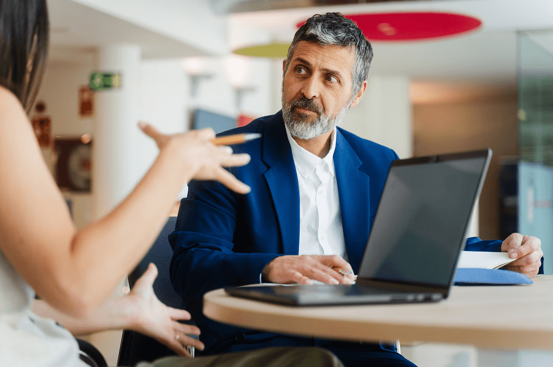 A financial advisor gives his clients advice on their 401(K) to help them retire better