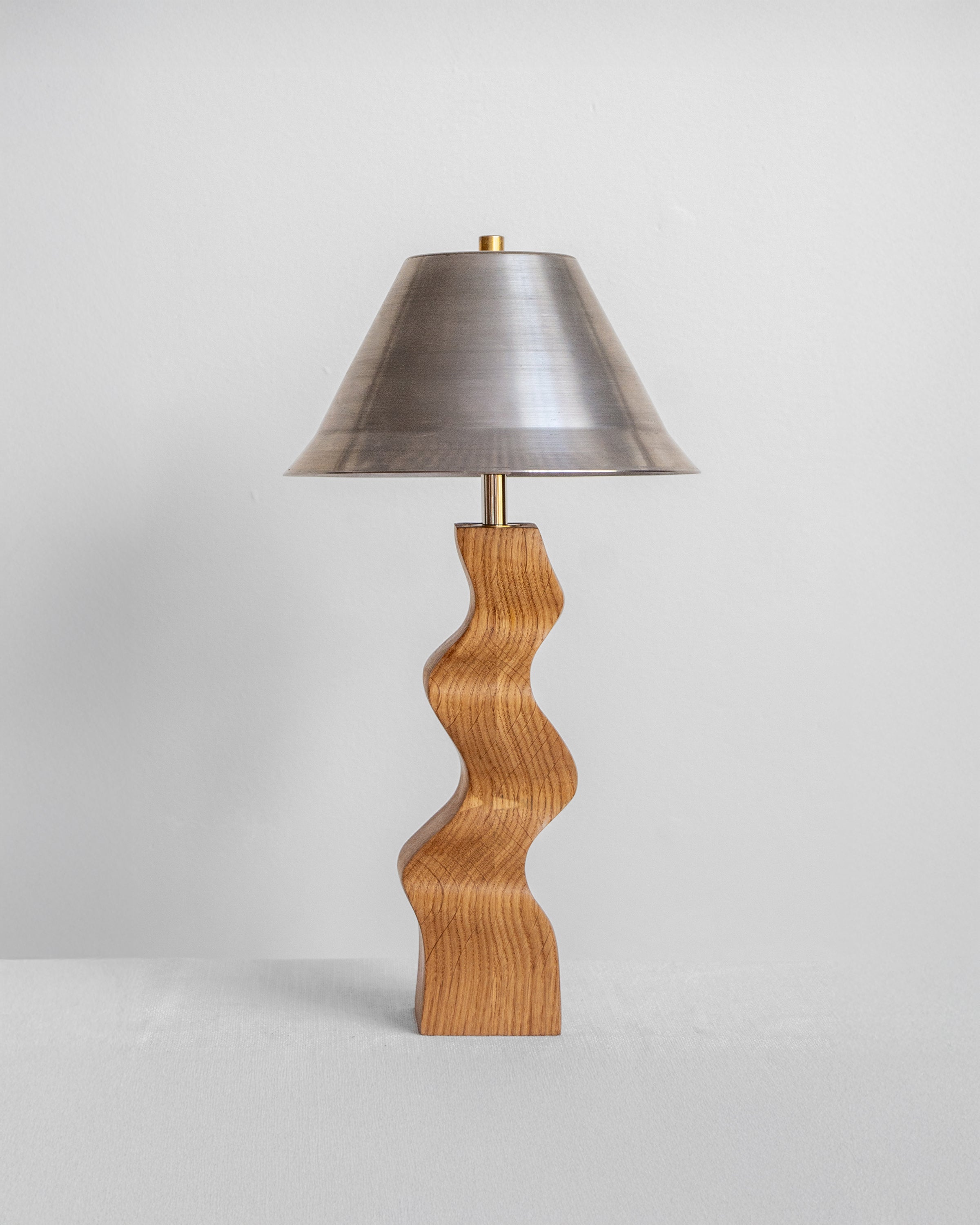 Rippled Desk Lamp in Oak with Raw Steel Shade with UK, EU and US/CA wiring available on white background Wilkinson & Rivera