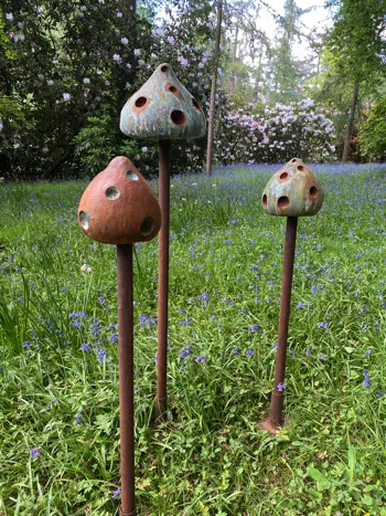 Enoki dot mushroom outdoor sculpture by Abby Martin
