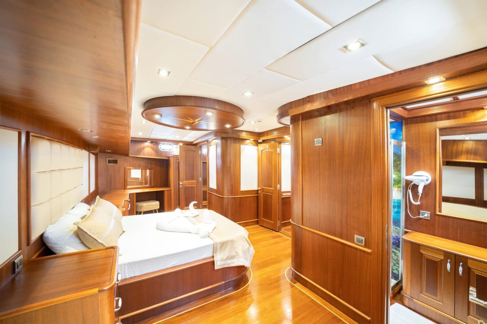 A person stands in a sandstone cave.