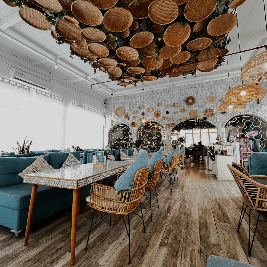 Boho-chic cafe interior at Sandersons Café in Abu Dhabi.