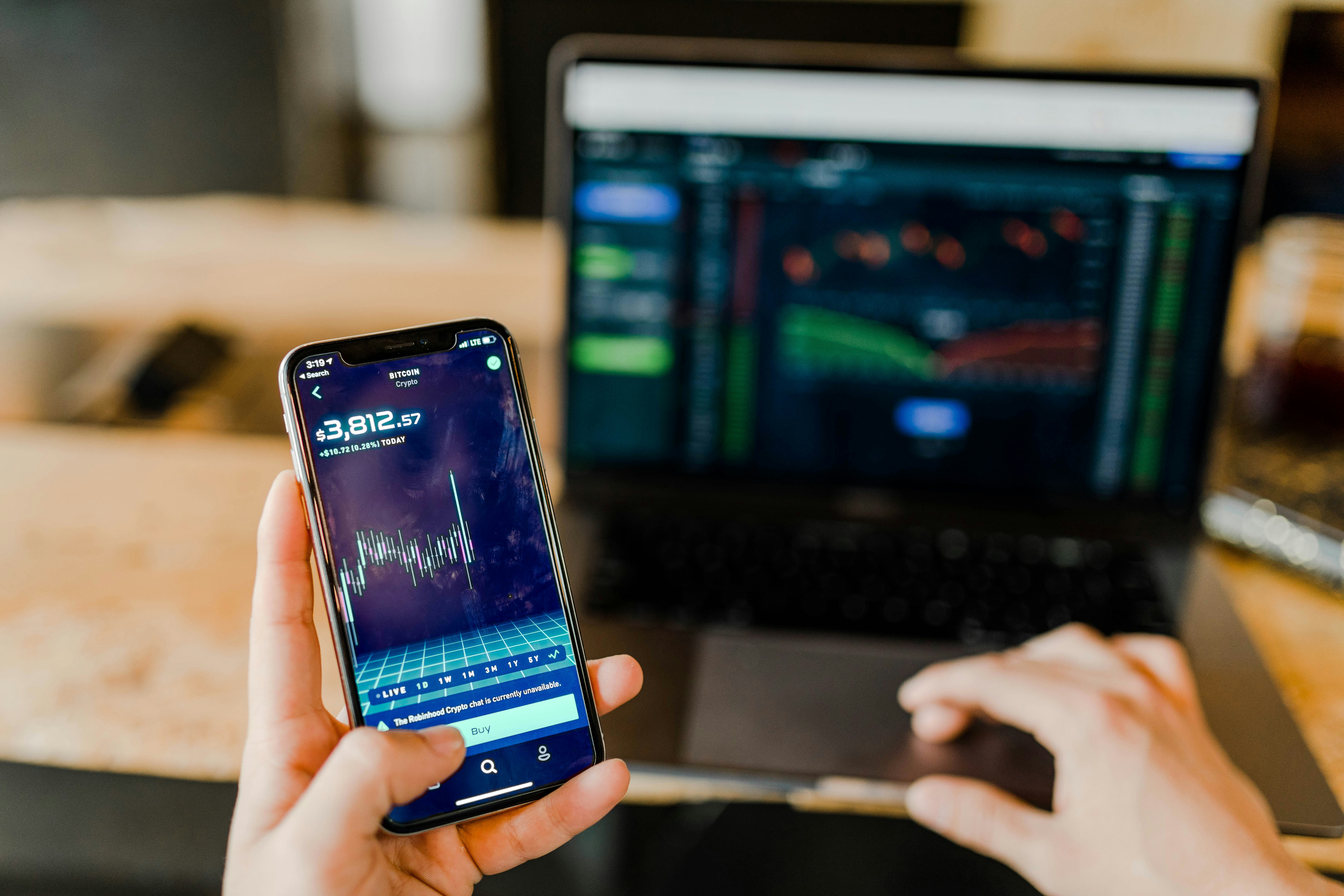 Person using Mobile for Trading - How To Read Options