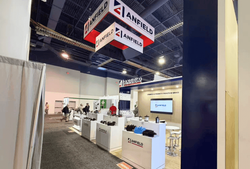 ANFIELD CONEXPO 2026 20x30 equipment display booth with graphics wall, product messaging, and open visitor flow