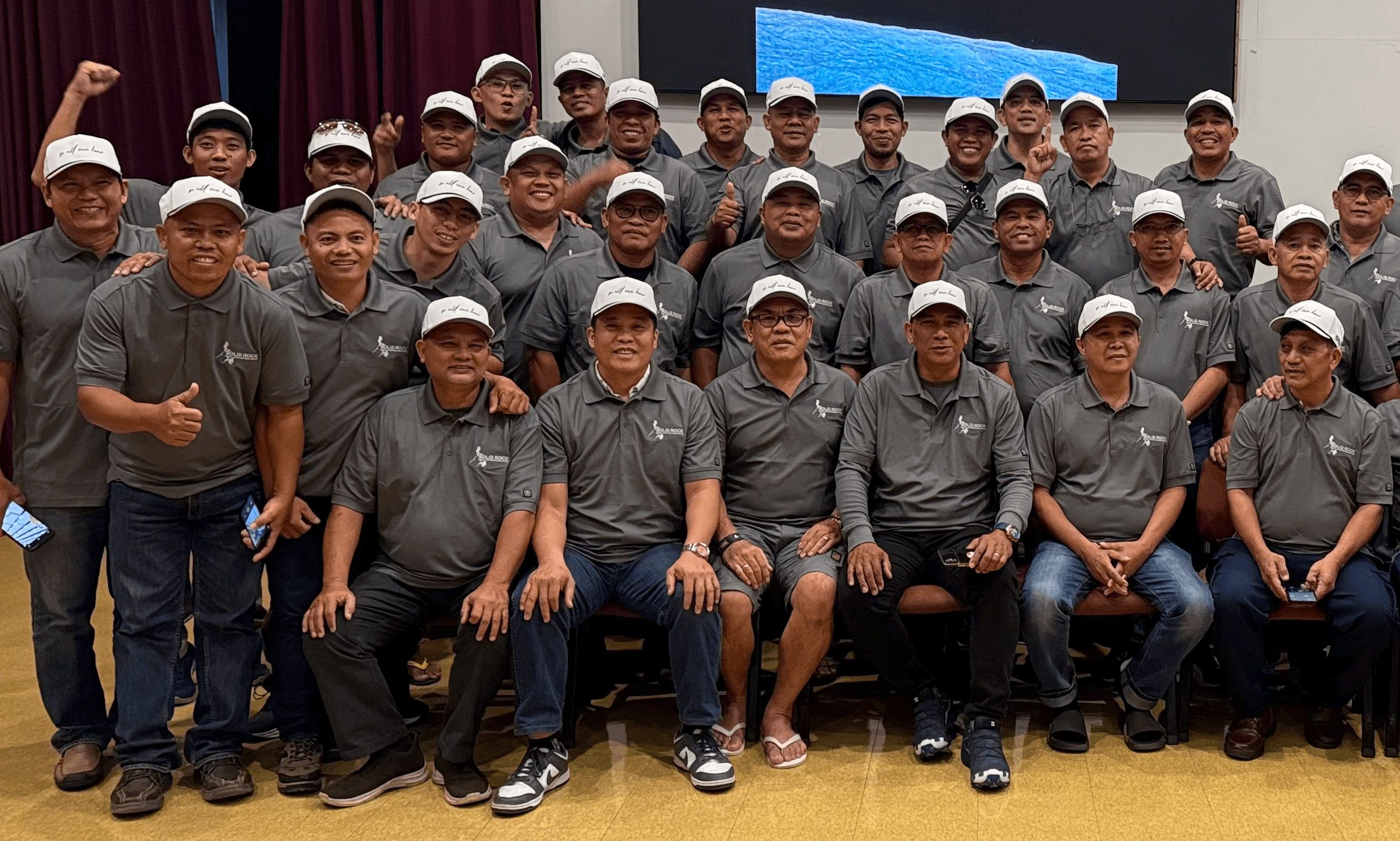 evangelists smiling for a picture