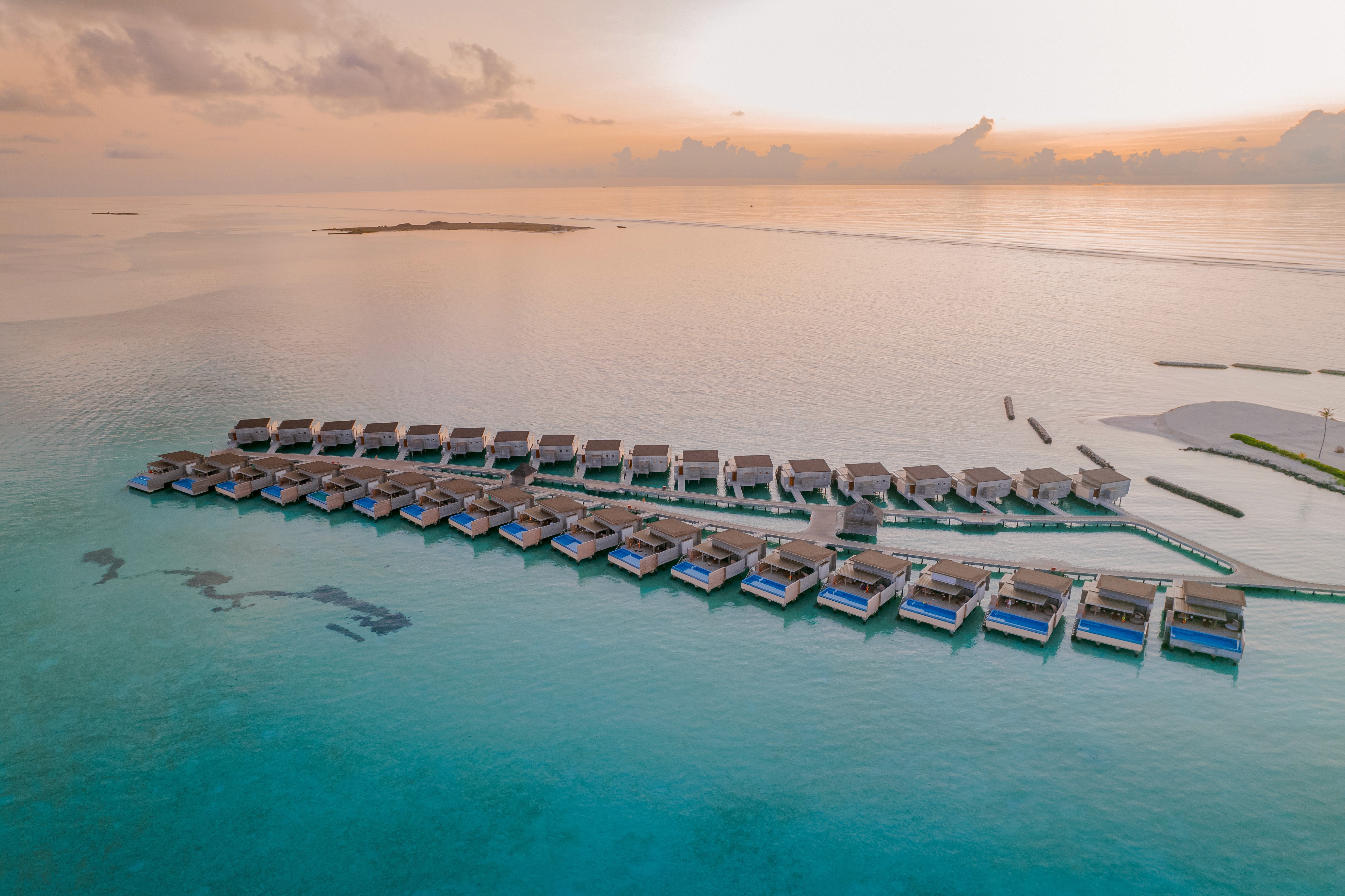 Aerial photo of an image in the Maldives at sunrise